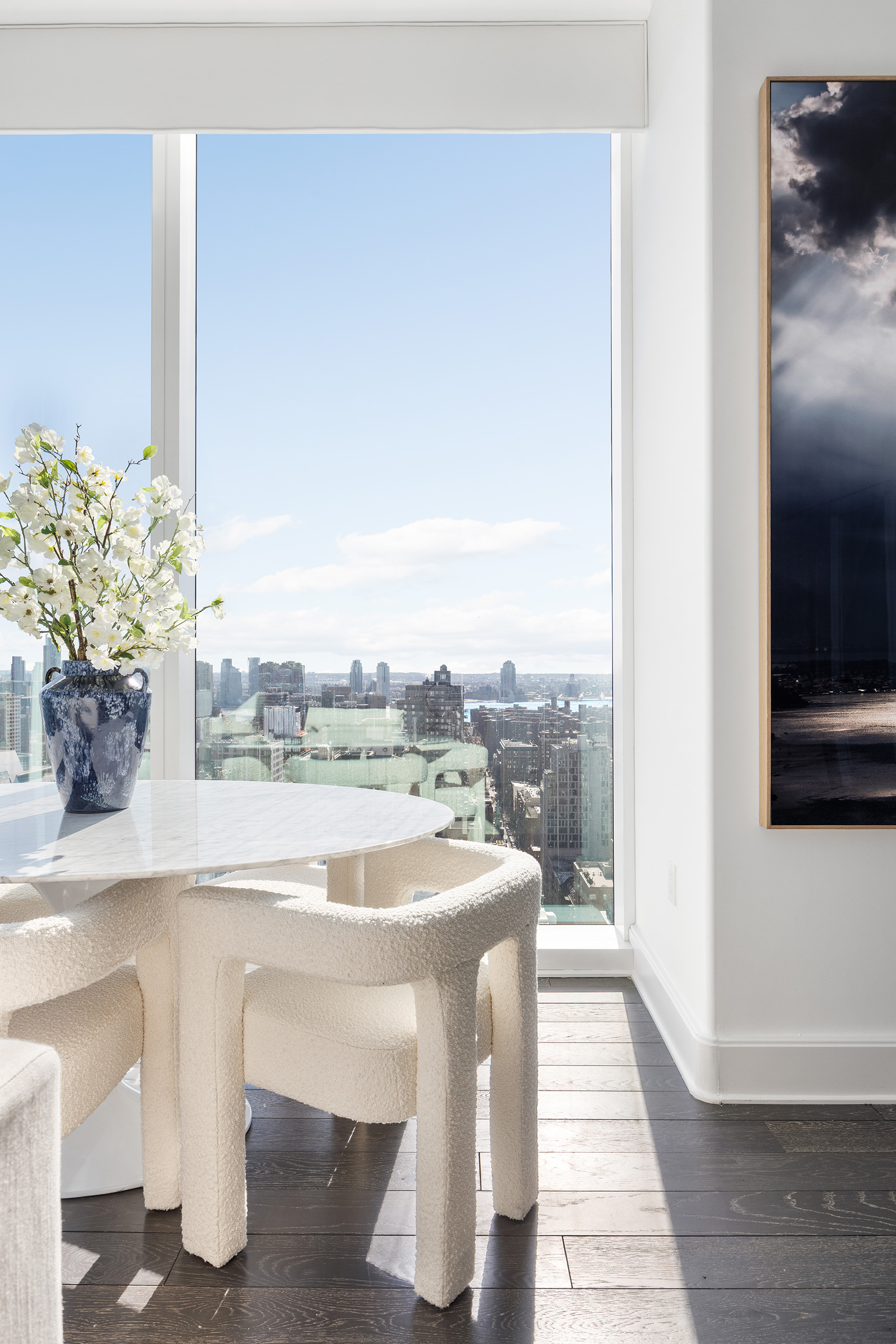 45 East 22nd Street, Unit 32B Manhattan, NY 10010 - Photo 9 of 36 a room with a table and chairs
