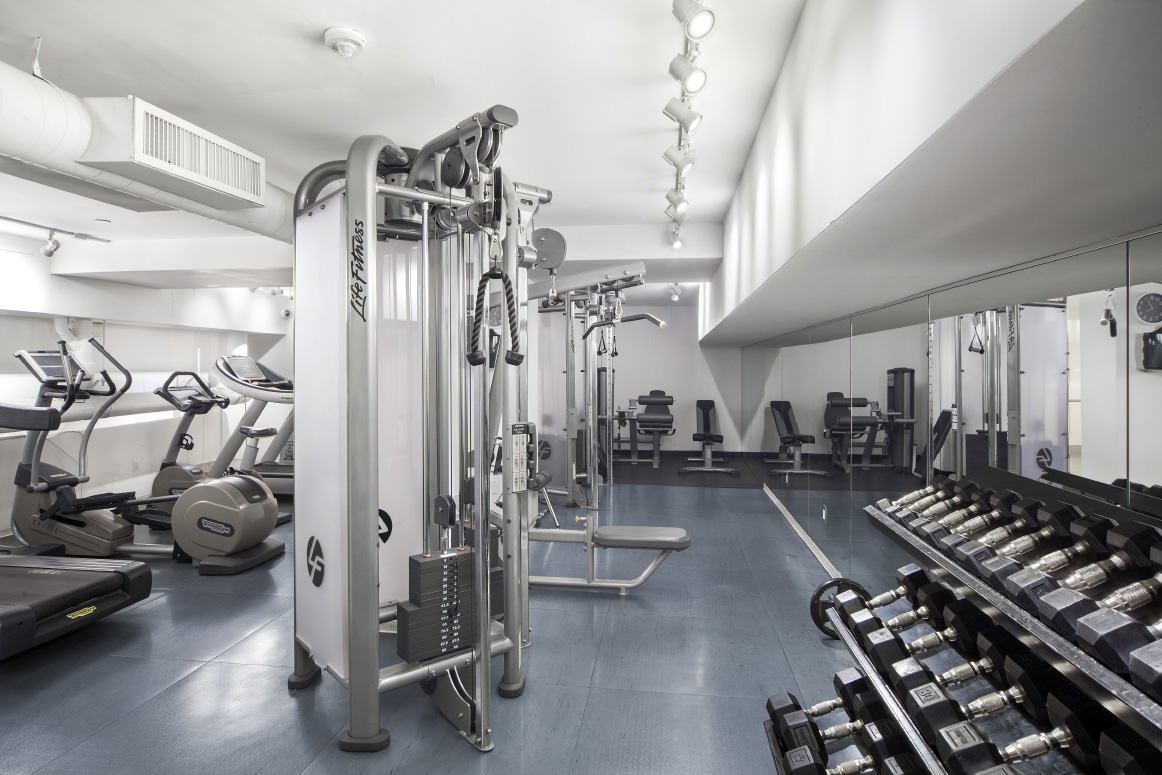 420 West 25th Street, Unit 3B Manhattan, NY 10001 - Photo 9 of 15 a view of a room with gym equipment