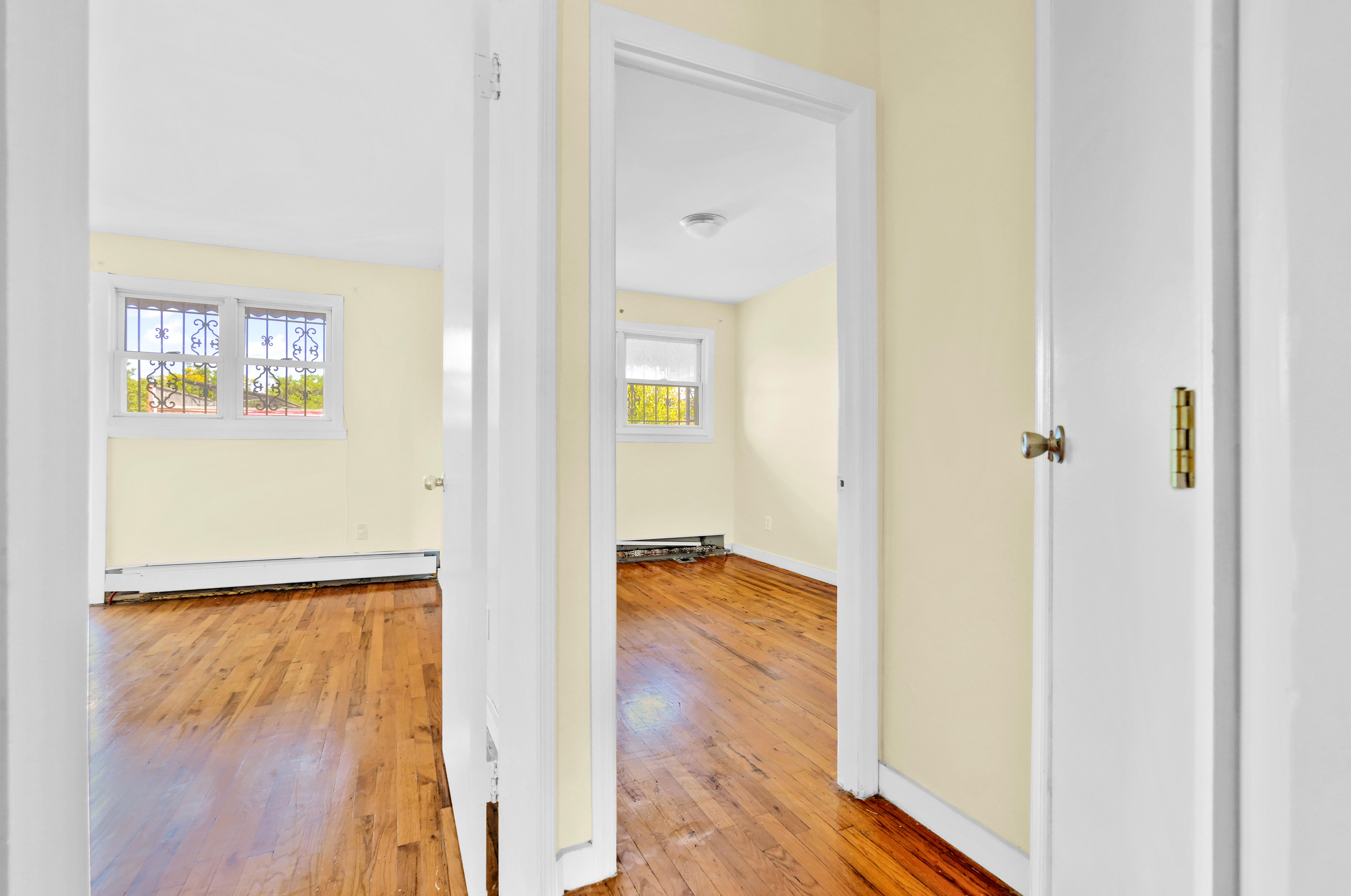 659 Jerome Street Brooklyn, NY 11207 - Photo 21 of 39 a view of hallway with wooden floor