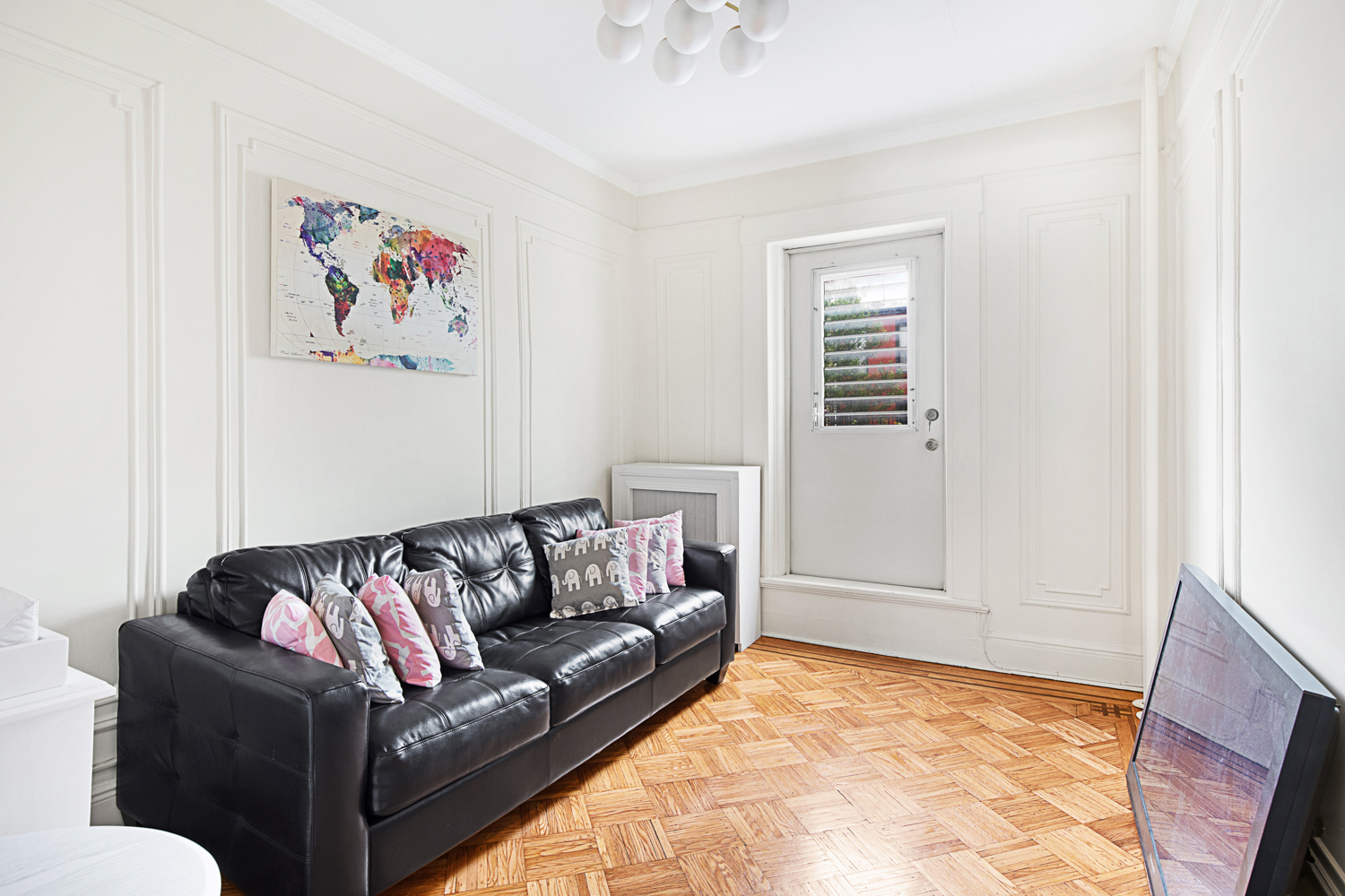 392 9th Street Brooklyn, NY 11215 - Photo 8 of 11 a living room with furniture and a rug
