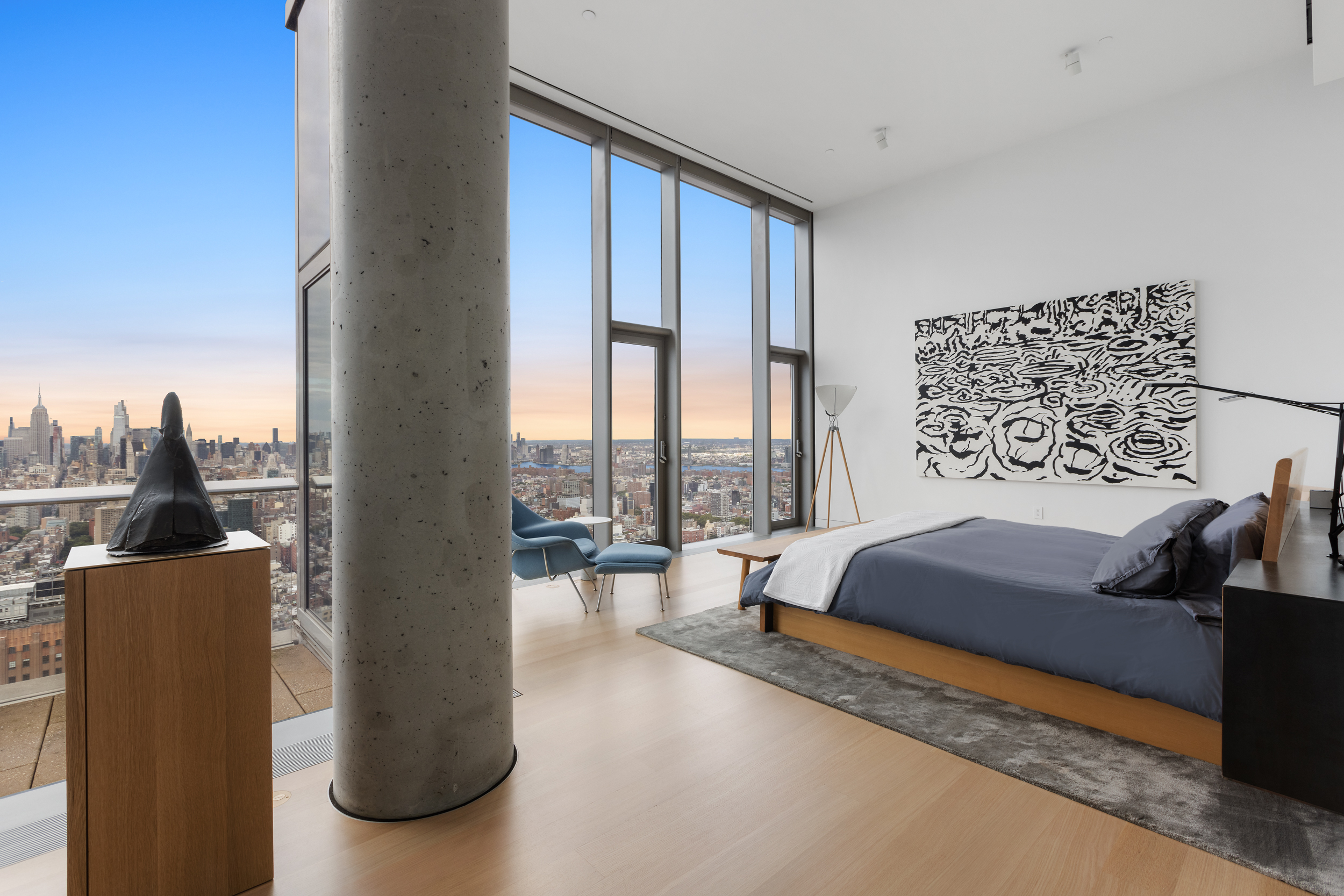 56 Leonard Street, Unit PH52A Manhattan, NY 10013 - Photo 10 of 24 a bedroom with a large bed and a large window