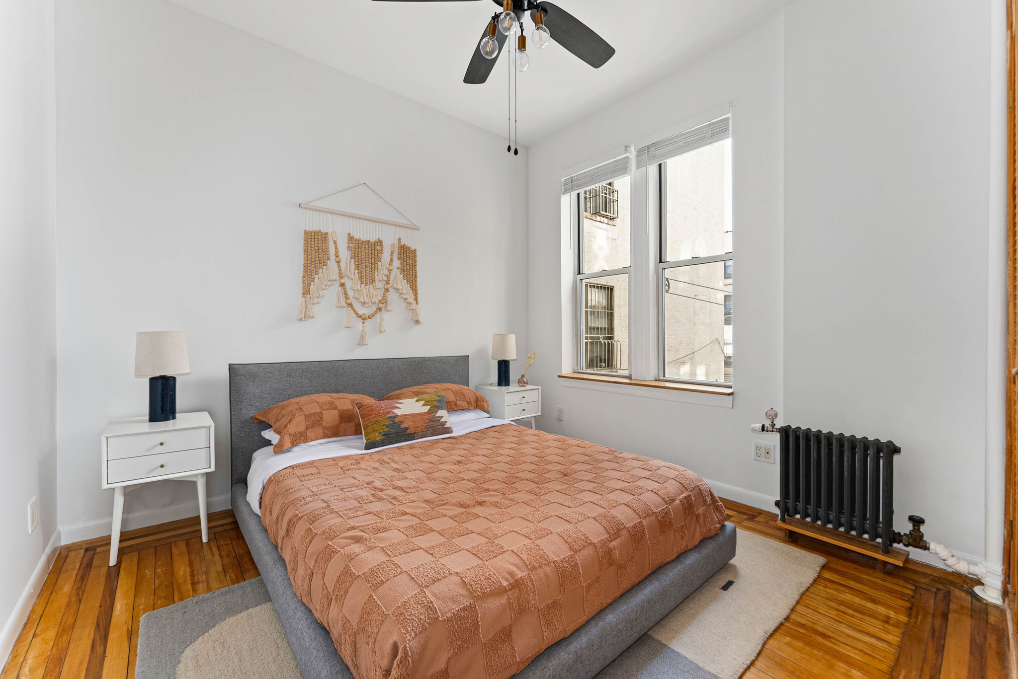 826 43rd Street, Unit 1 Brooklyn, NY 11232 - Photo 5 of 12 a bedroom with a bed and a window