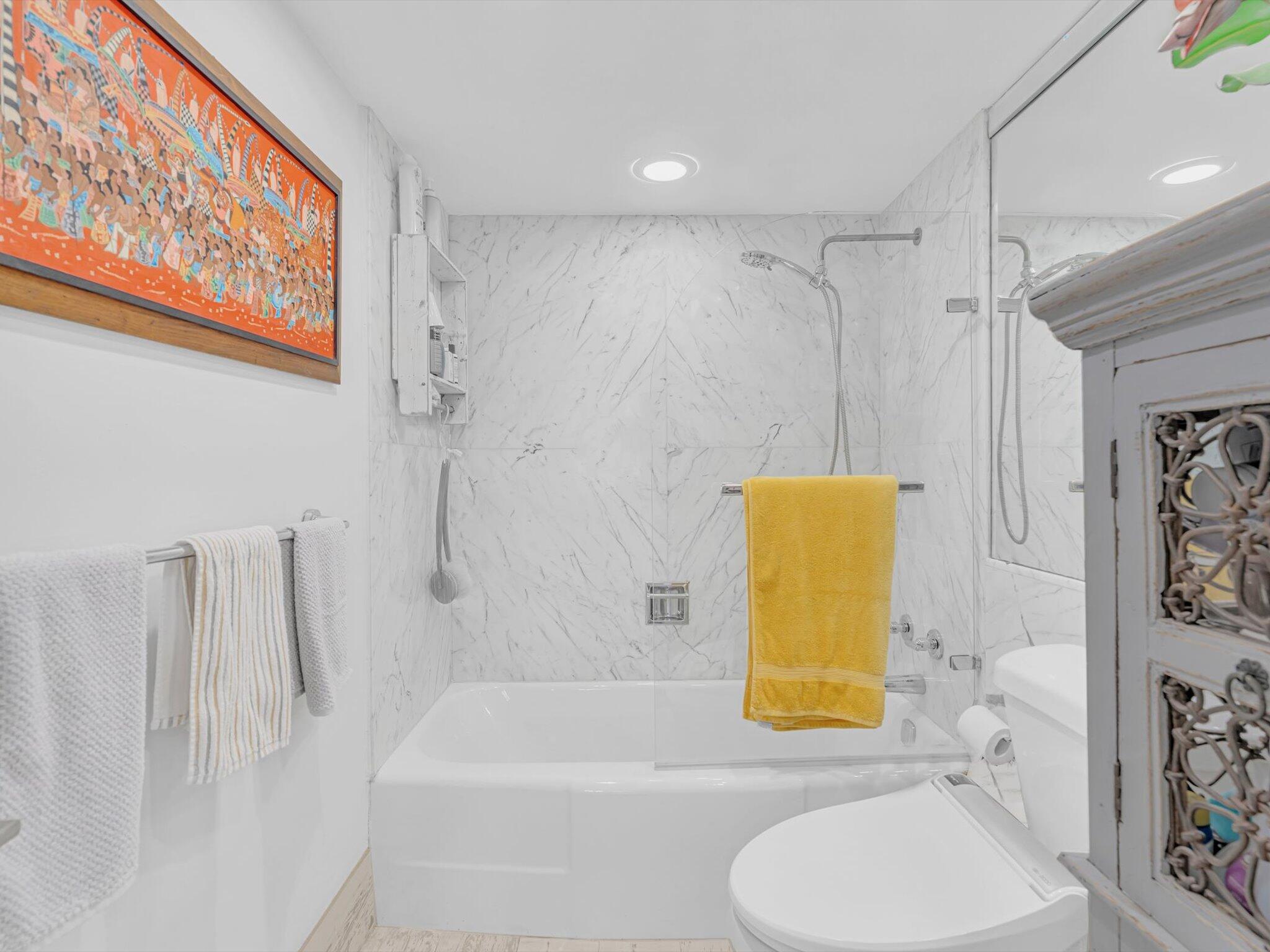 3000 South Ocean Boulevard, Unit 1504 Boca Raton, FL 33432 - Photo 29 of 64 a bathroom with a sink and a bathtub