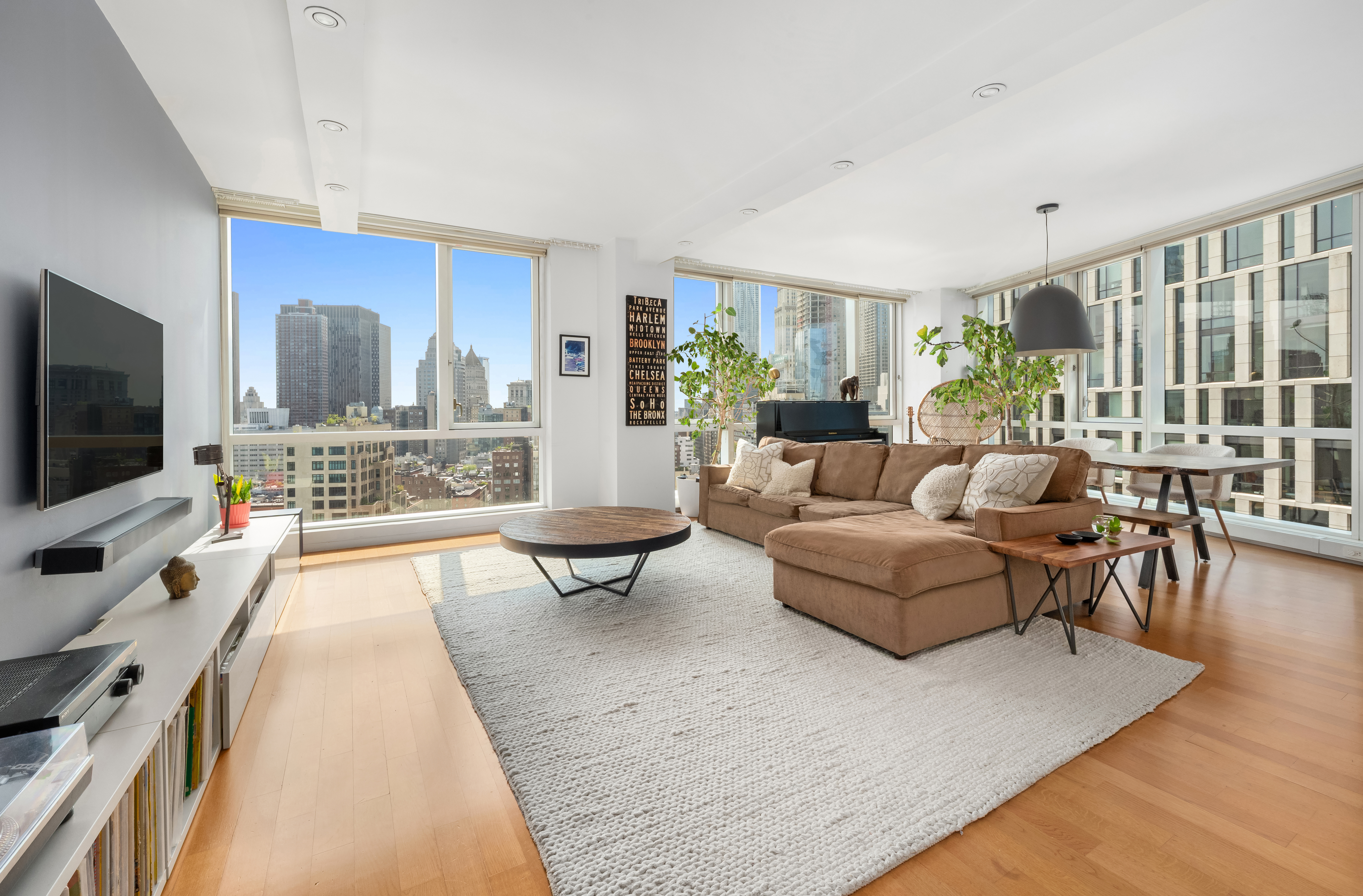 a living room with fireplace furniture and a flat screen tv