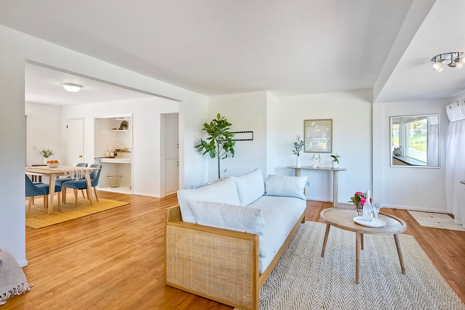 534 Hoover Street Oceanside, CA 92054 - Photo 7 of 31 a living room with furniture and a wooden floor