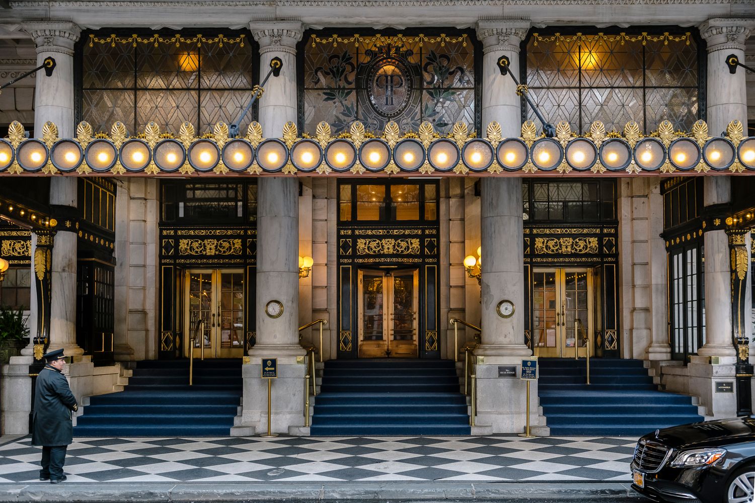 1 Central Park South, Unit 1241 Manhattan, NY 10019 - Photo 11 of 14 a front view of a building with lots of green space