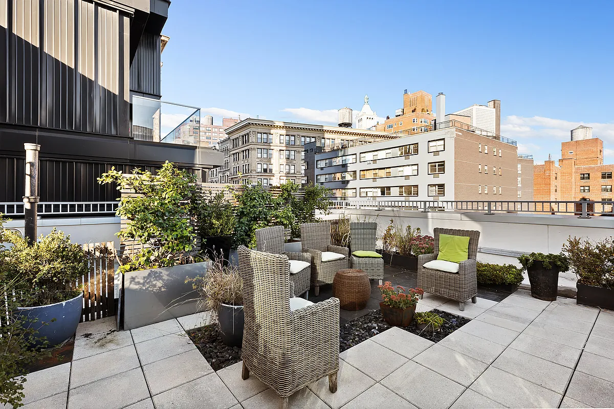 67 East 11th Street, Unit 624 Manhattan, NY 10003 - Photo 8 of 13 a view of a patio with furniture and a potted plants