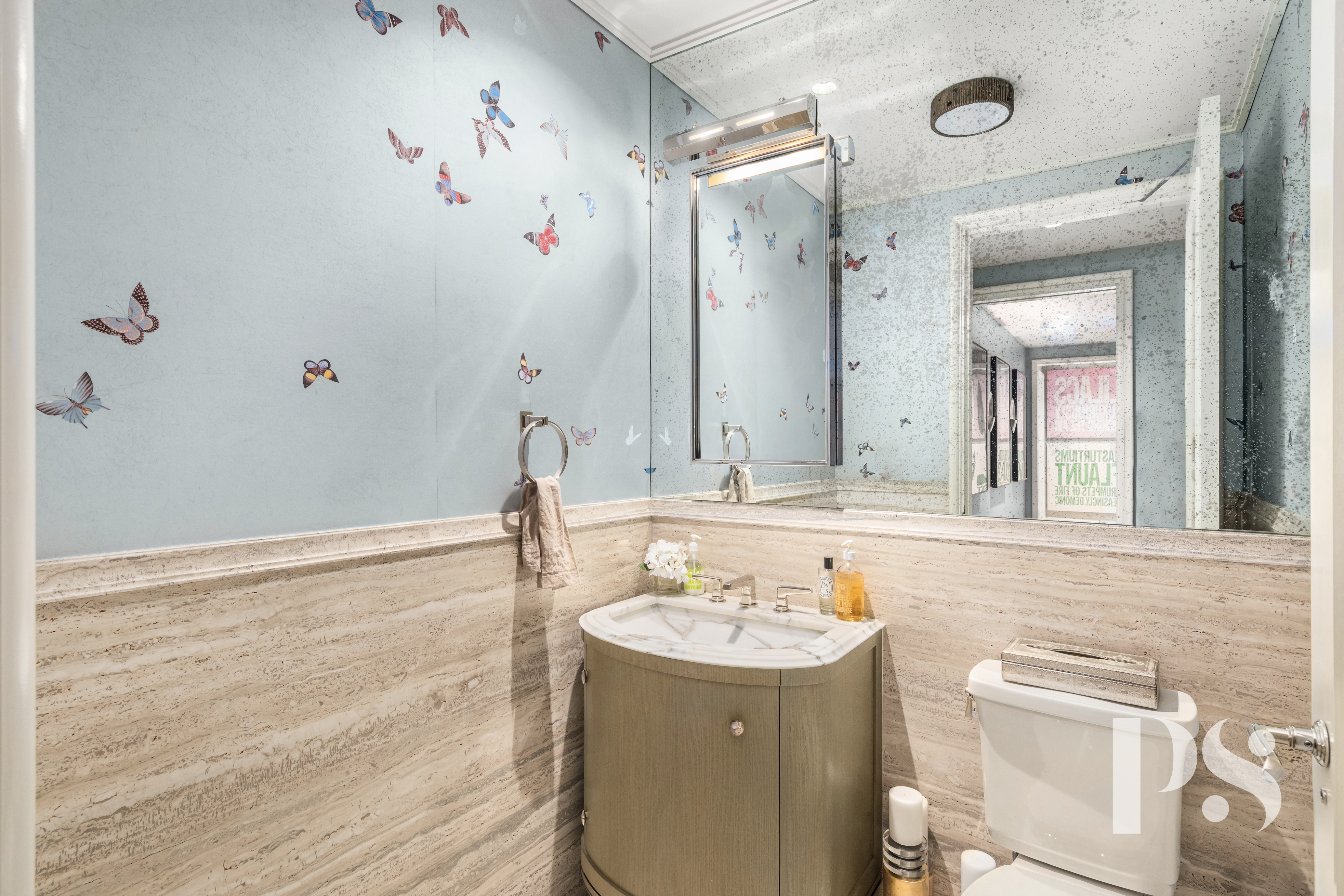 135 East 79th Street, Unit 8E Manhattan, NY 10075 - Photo 22 of 26 a bathroom with a sink and a mirror