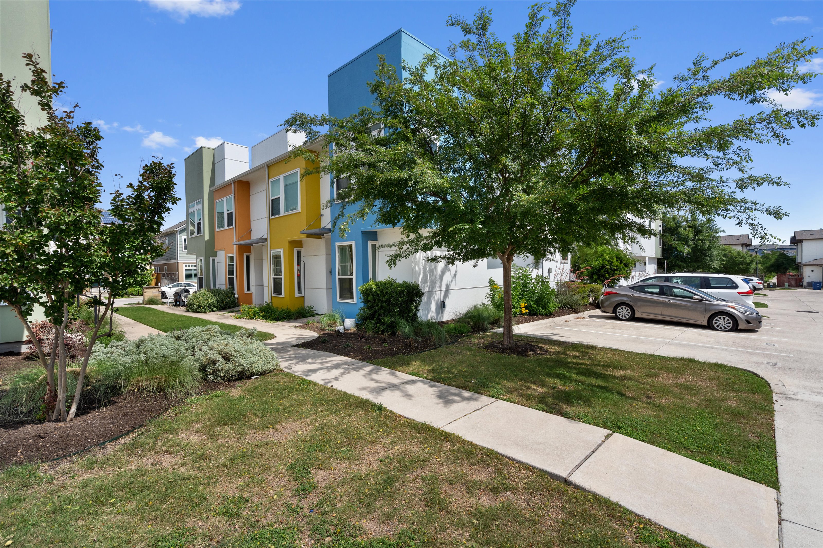 4330 Olenick Street Austin, TX 78723 - Photo 9 of 29 a view of a parked cars in front of a house