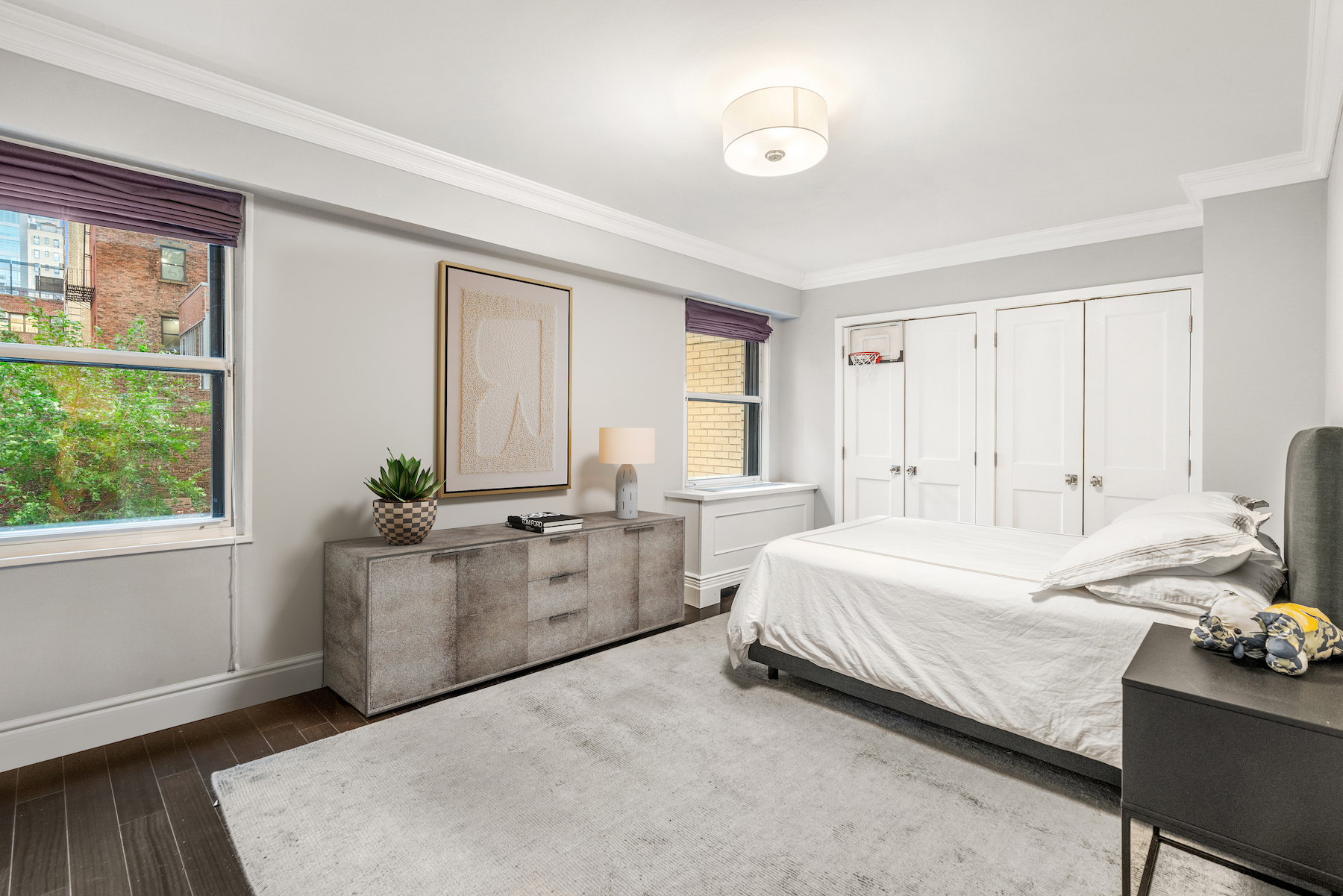 178 East 80th Street, Unit 3A Manhattan, NY 10075 - Photo 7 of 14 a bedroom with a bed furniture and a window