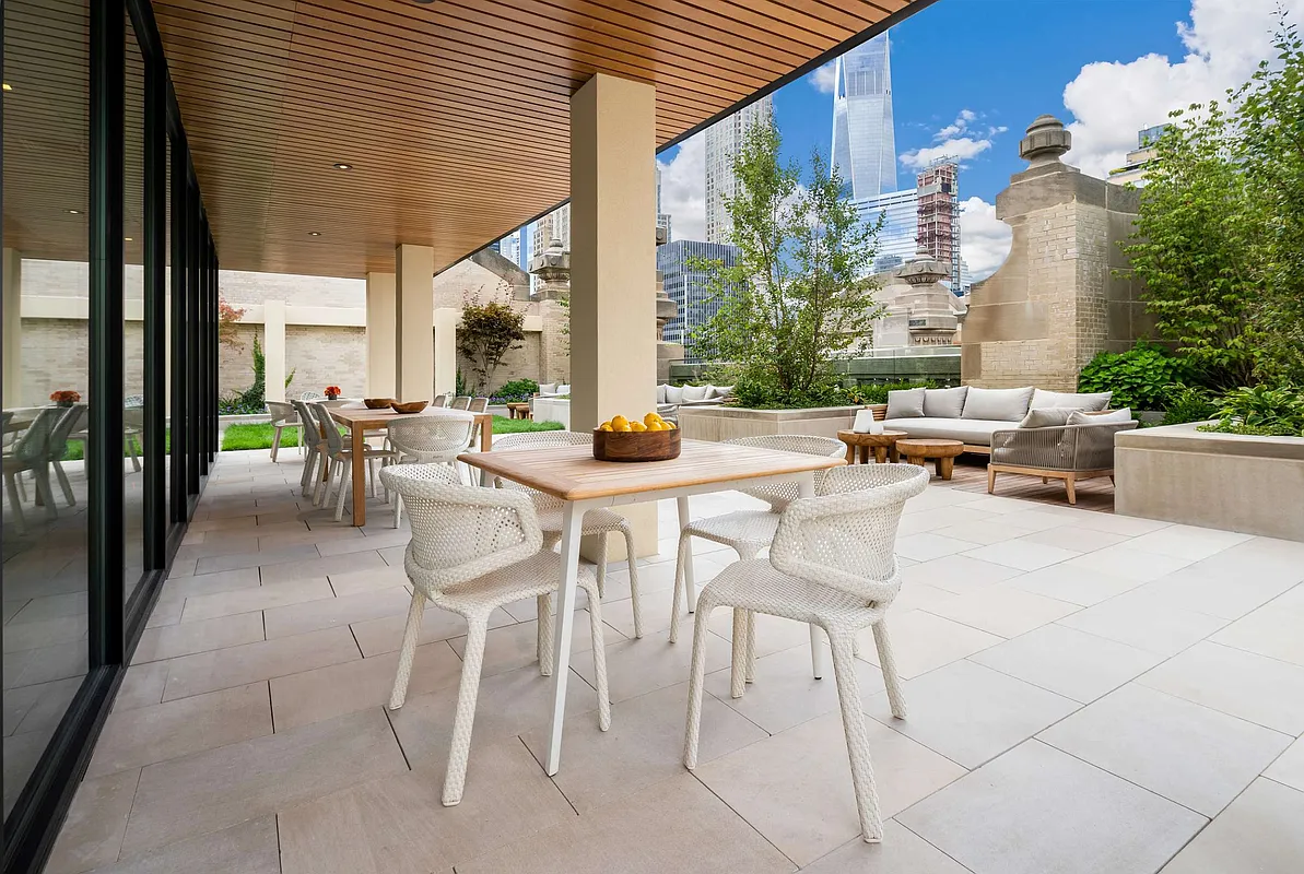 49 Chambers Street, Unit 9G Manhattan, NY 10007 - Photo 14 of 28 a view of a patio with chairs and tables