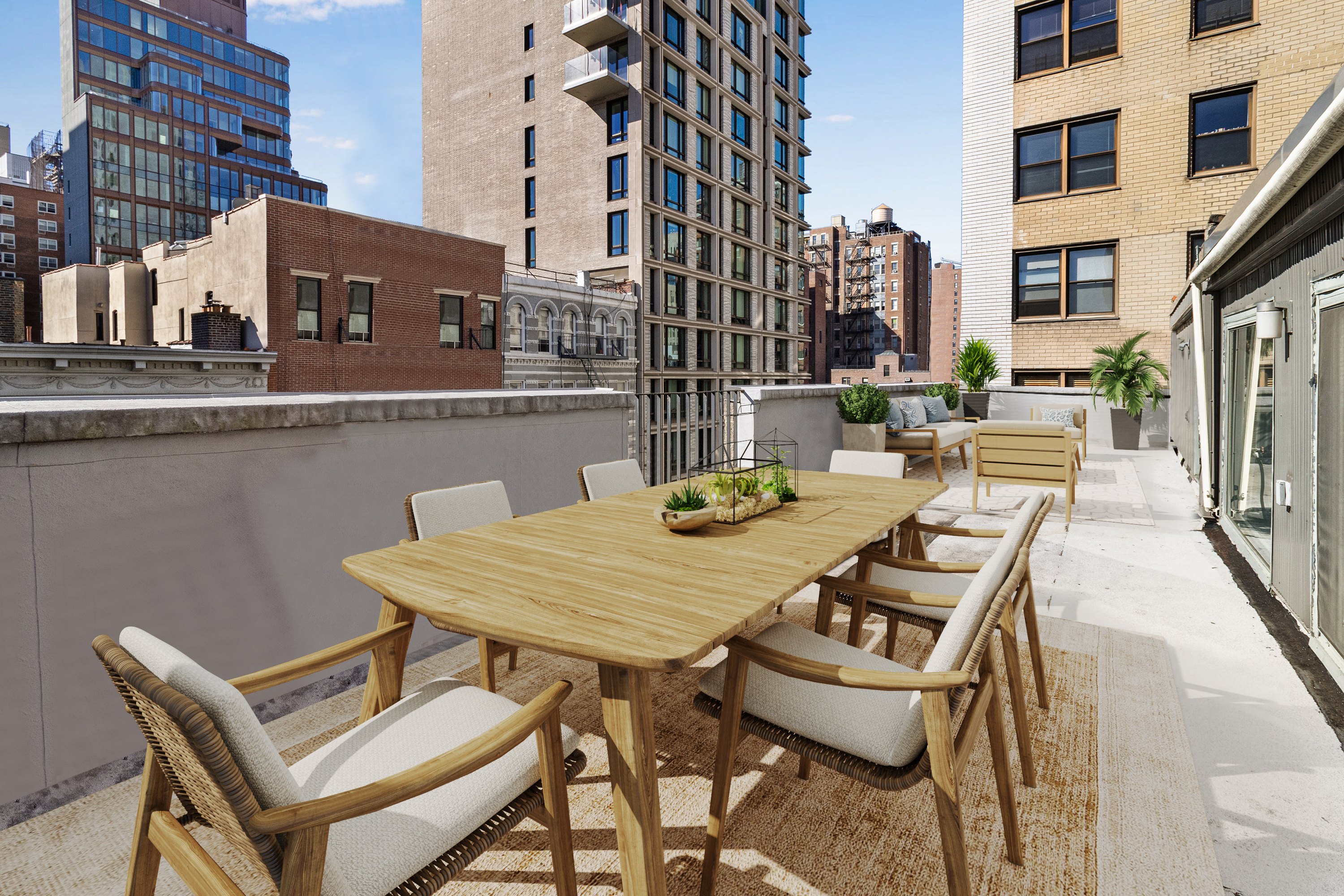 a view of a patio with a table and chairs