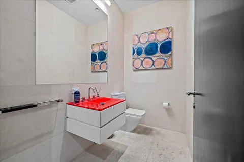 a bathroom with a sink and a shower curtain