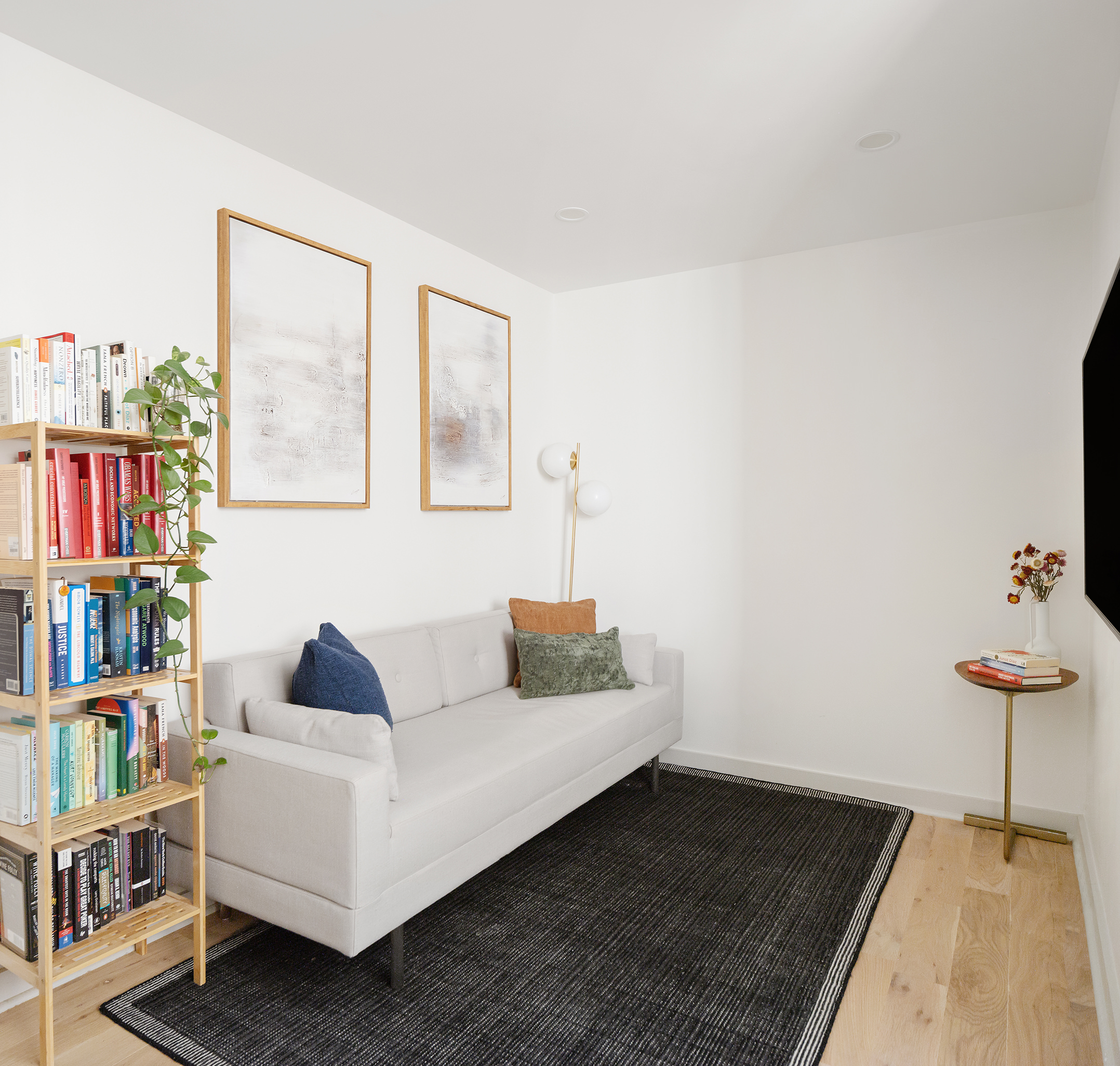 1015 A President Street, Unit 2F Brooklyn, NY 11225 - Photo 4 of 8 a living room with furniture and a book shelf
