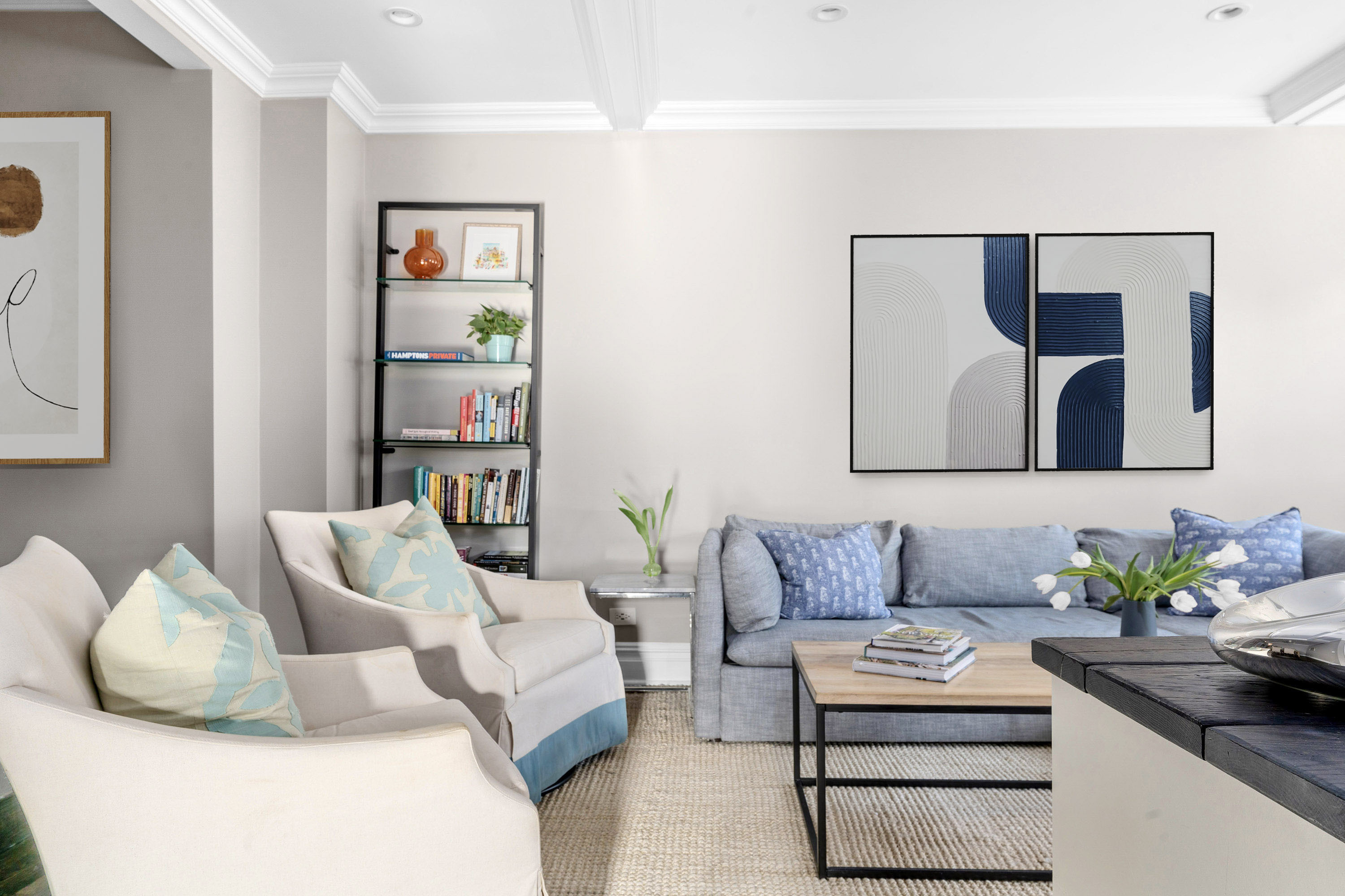 75 Bank Street, Unit 3K Manhattan, NY 10014 - Photo 5 of 11 a living room with furniture and painting on the wall