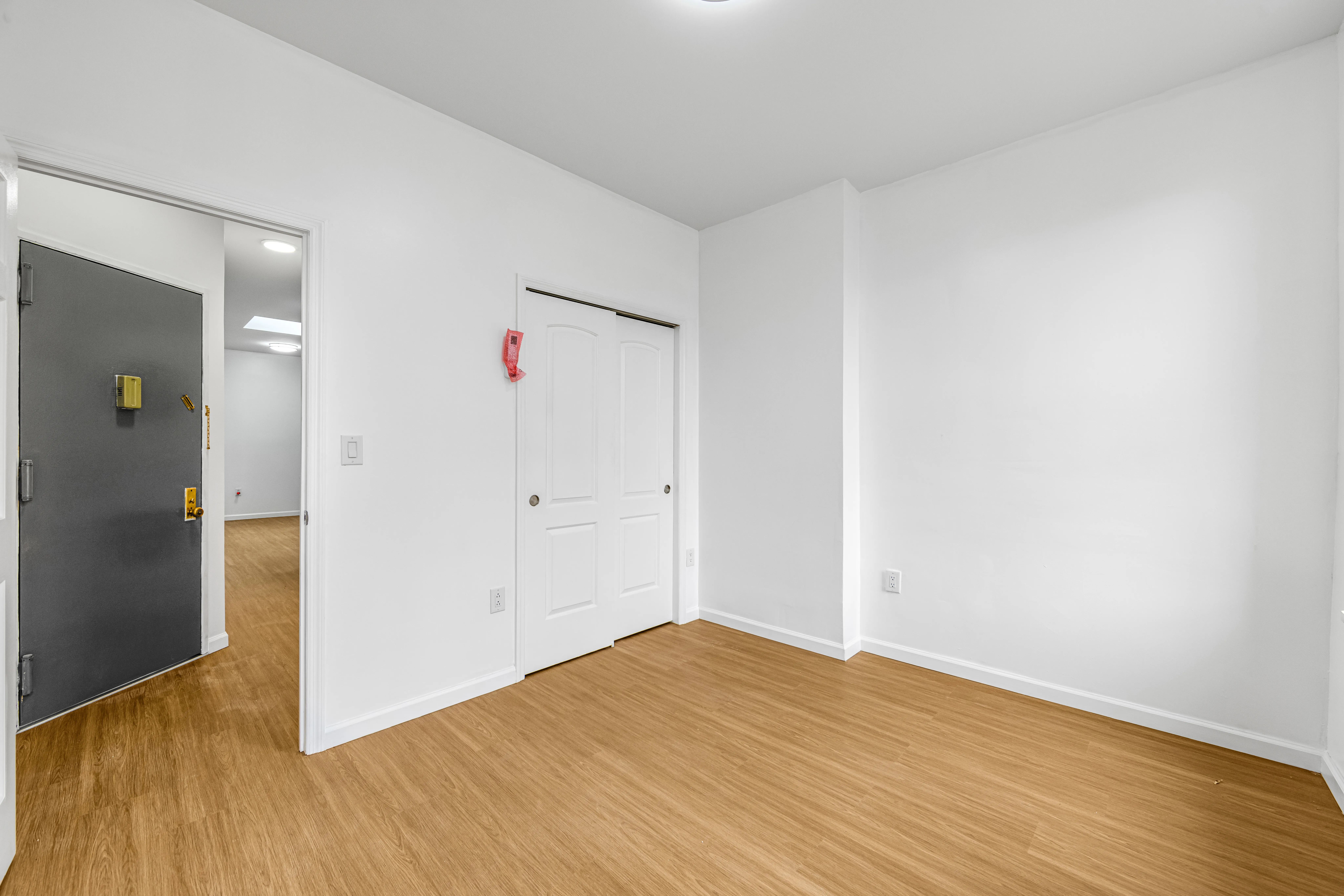 141 23rd Street, Unit 3L Brooklyn, NY 11232 - Photo 6 of 9 wooden floor in an empty room
