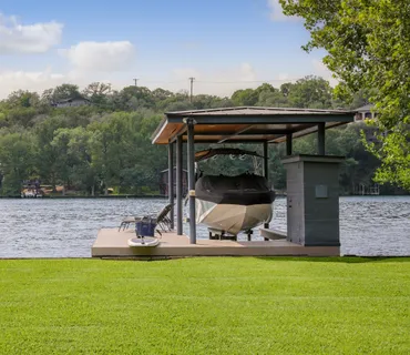 a view of a lake with a big yard