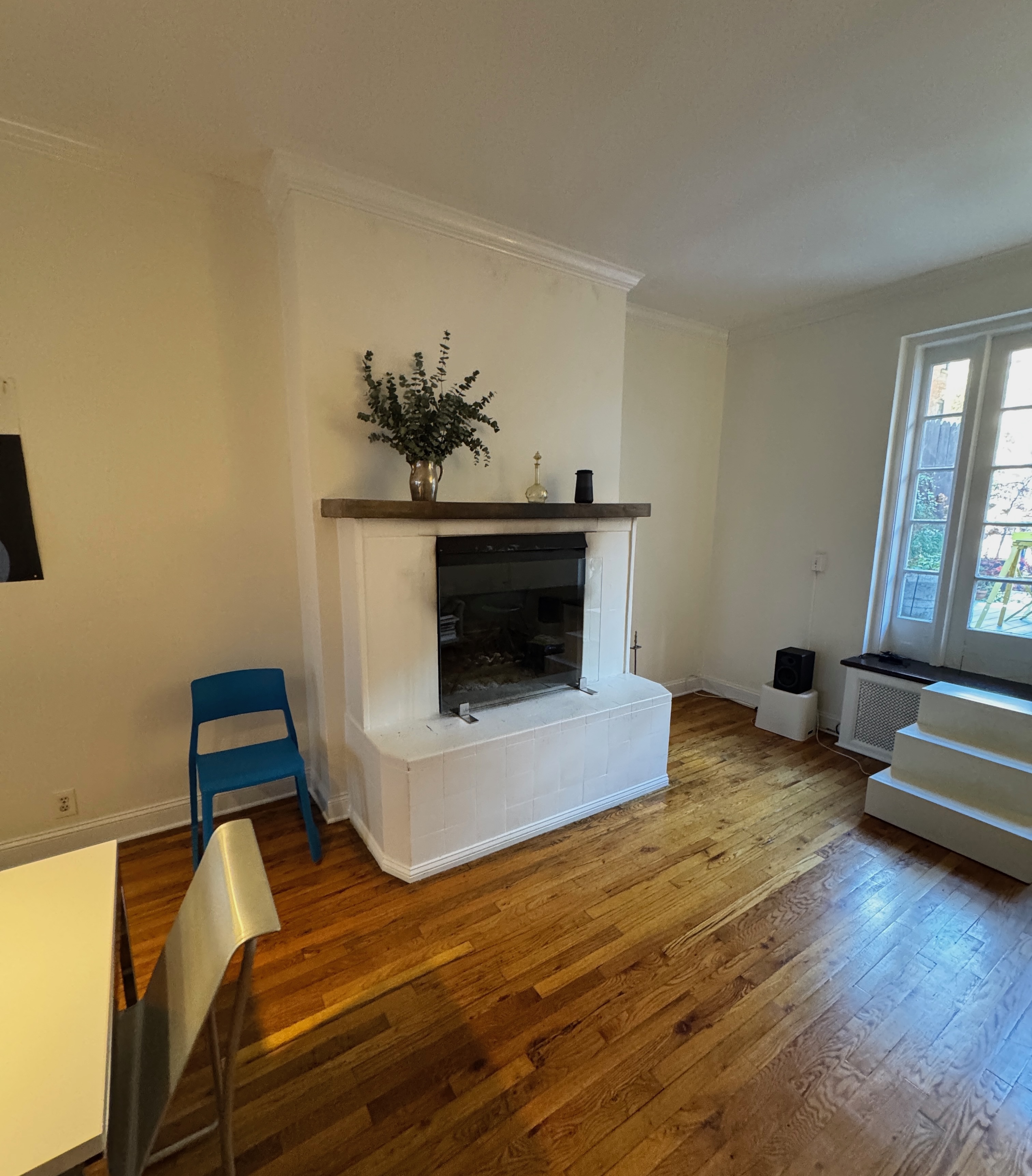 19 Vandam Street, Unit 2 Manhattan, NY 10014 - Photo 2 of 19 a living room with furniture and a fireplace