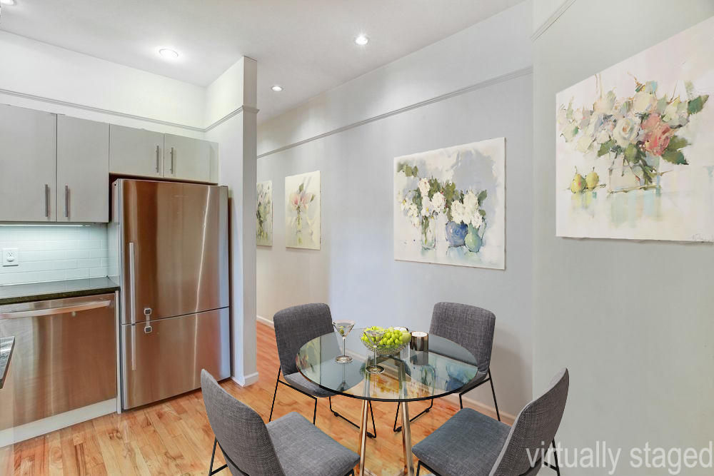 779 Riverside Drive, Unit B60 Manhattan, NY 10032 - Photo 2 of 9 a kitchen with stainless steel appliances granite countertop a dining table and chairs