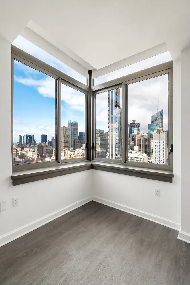 a view of a city from a room