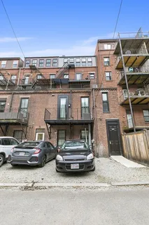 a car parked in front of a building