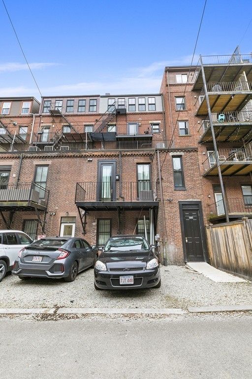 a car parked in front of a building