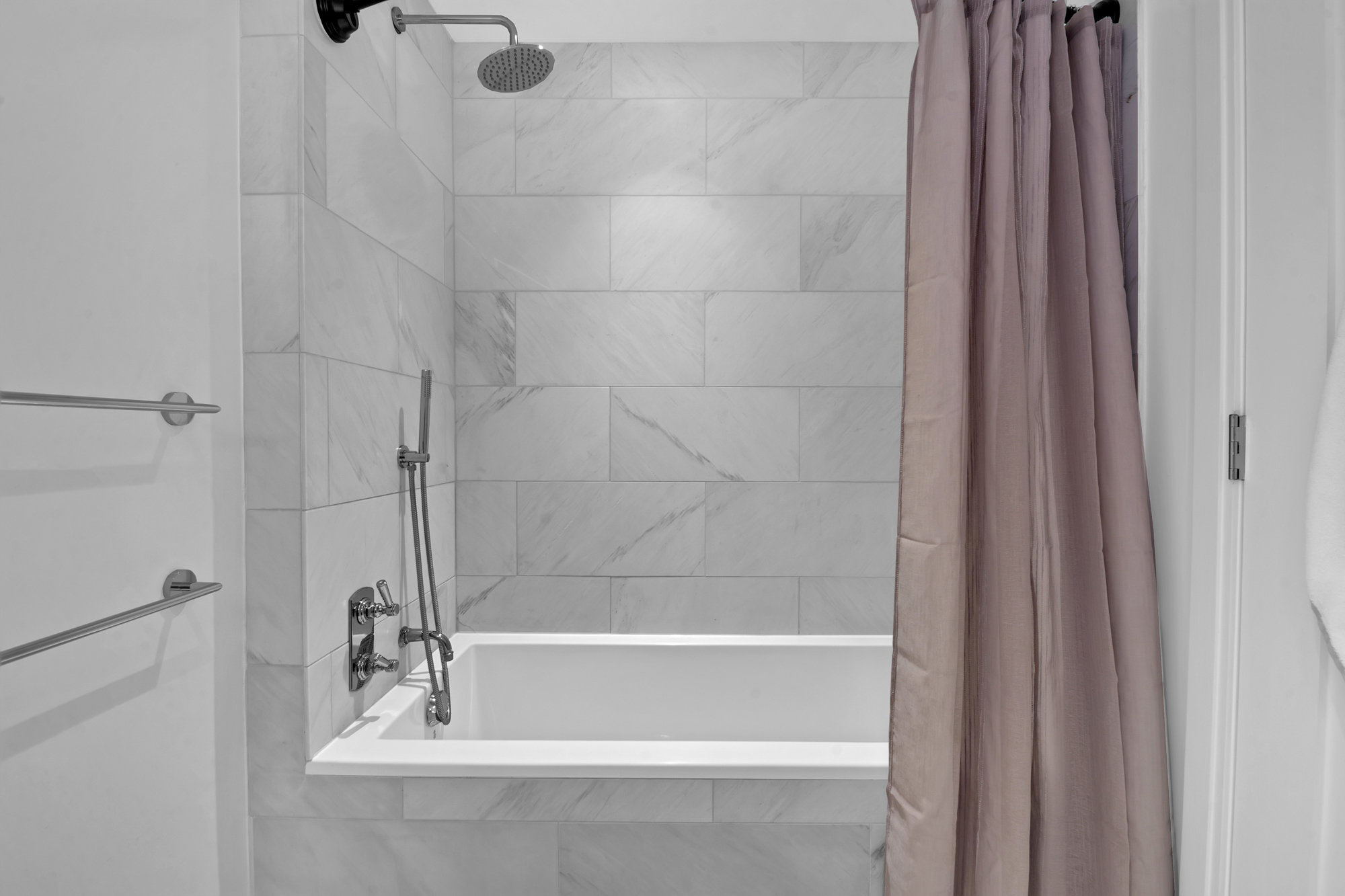 300 West 122nd Street, Unit 6R Manhattan, NY 10027 - Photo 7 of 23 a bathroom with a shower and a bath tub