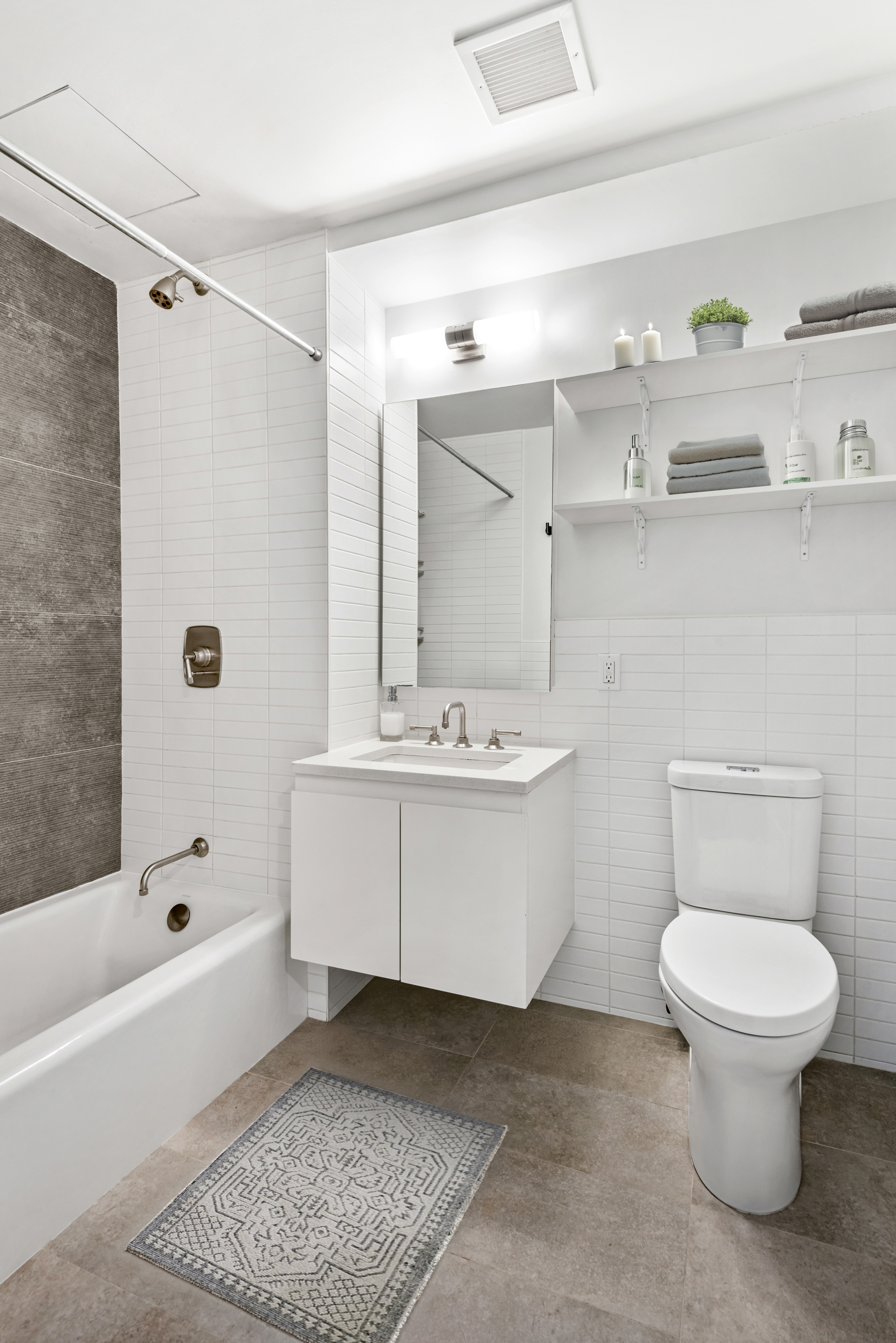 147 Hope Street, Unit 2D Brooklyn, NY 11211 - Photo 7 of 13 a bathroom with a sink toilet and shower