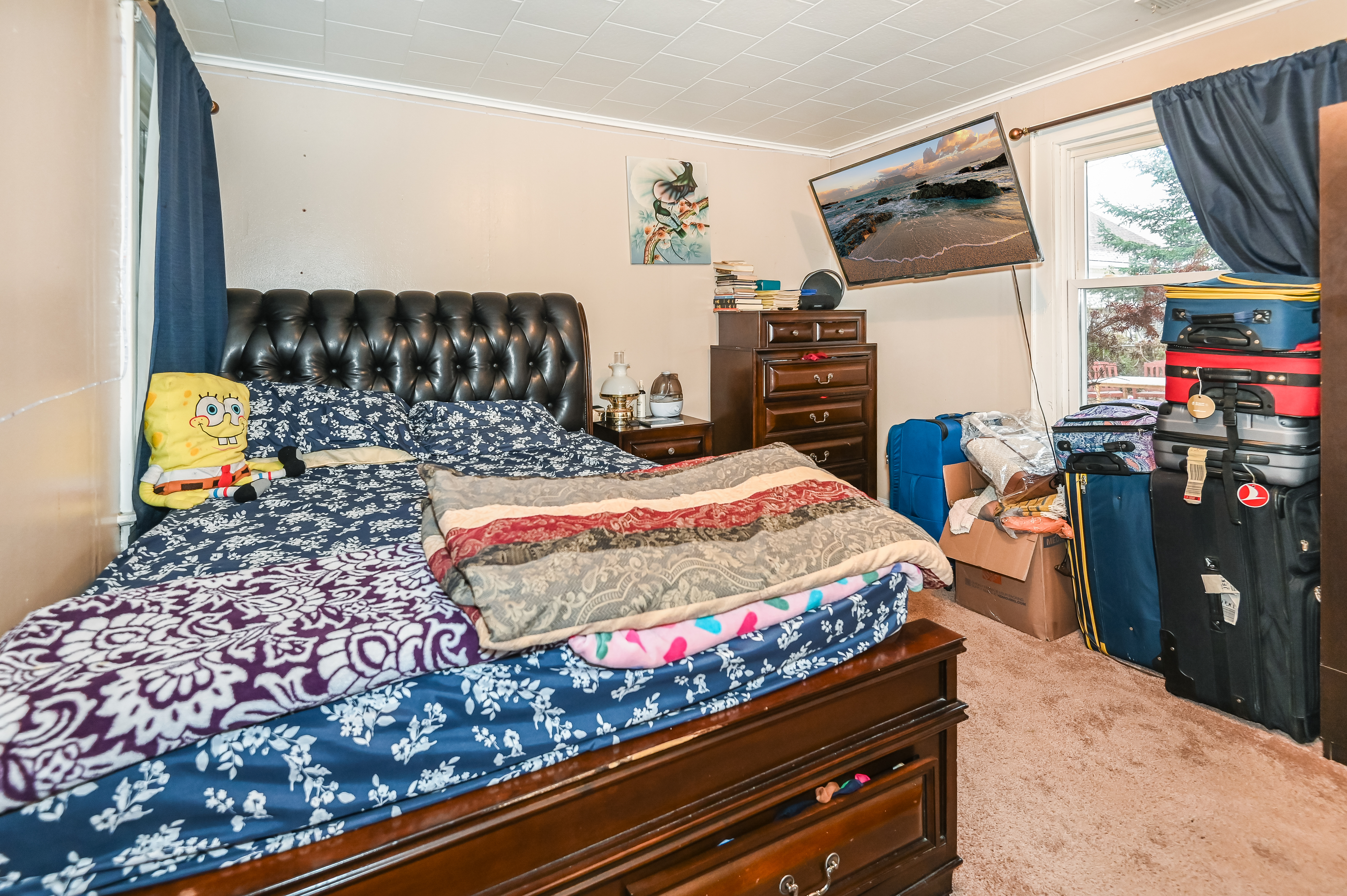 137 Hiawatha Boulevard Lake Hiawatha, NJ 07034 - Photo 18 of 21 a bedroom with bed and wooden floor
