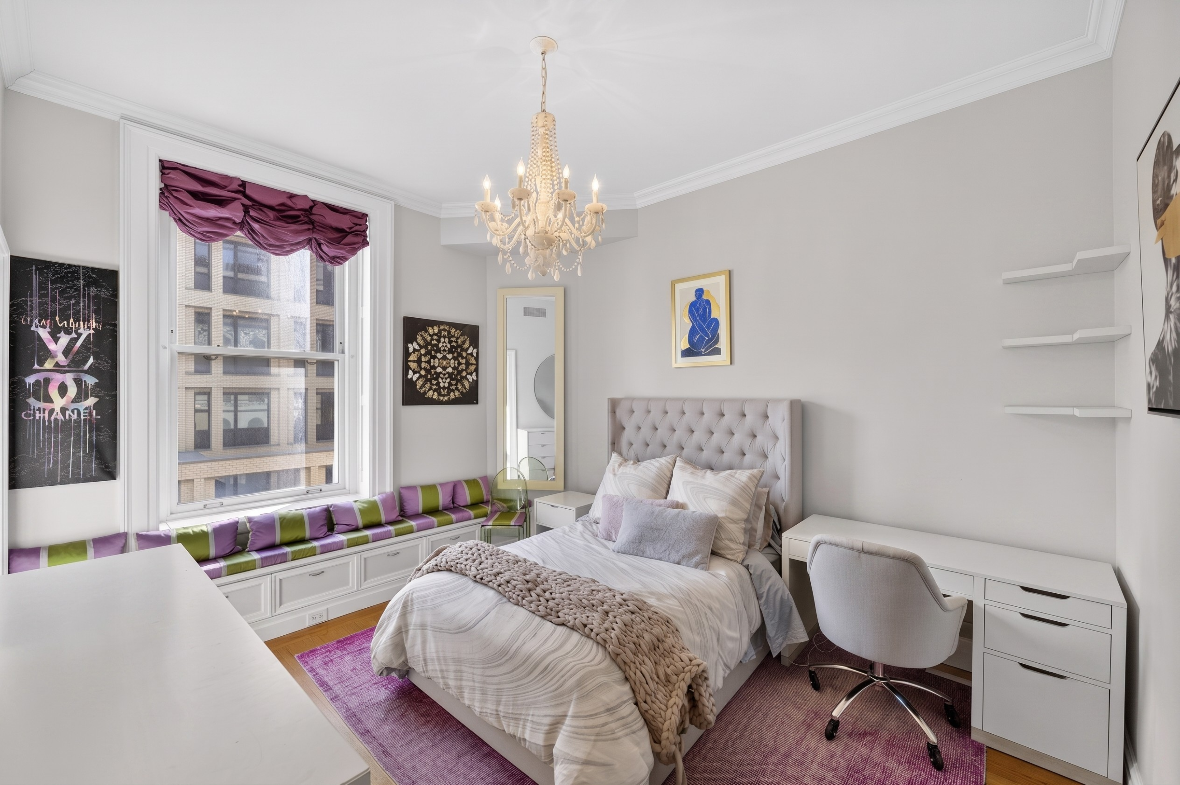 390 West End Avenue, Unit 11C Manhattan, NY 10024 - Photo 13 of 28 a bedroom with a bed and a chandelier