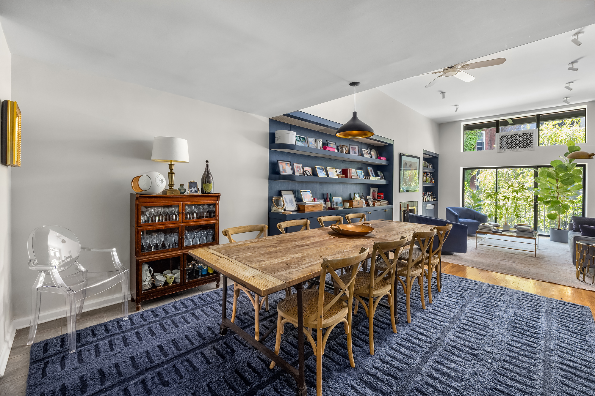 430 West 23rd Street, Unit C Manhattan, NY 10011 - Photo 6 of 16 a view of a dining room with furniture window and wooden floor