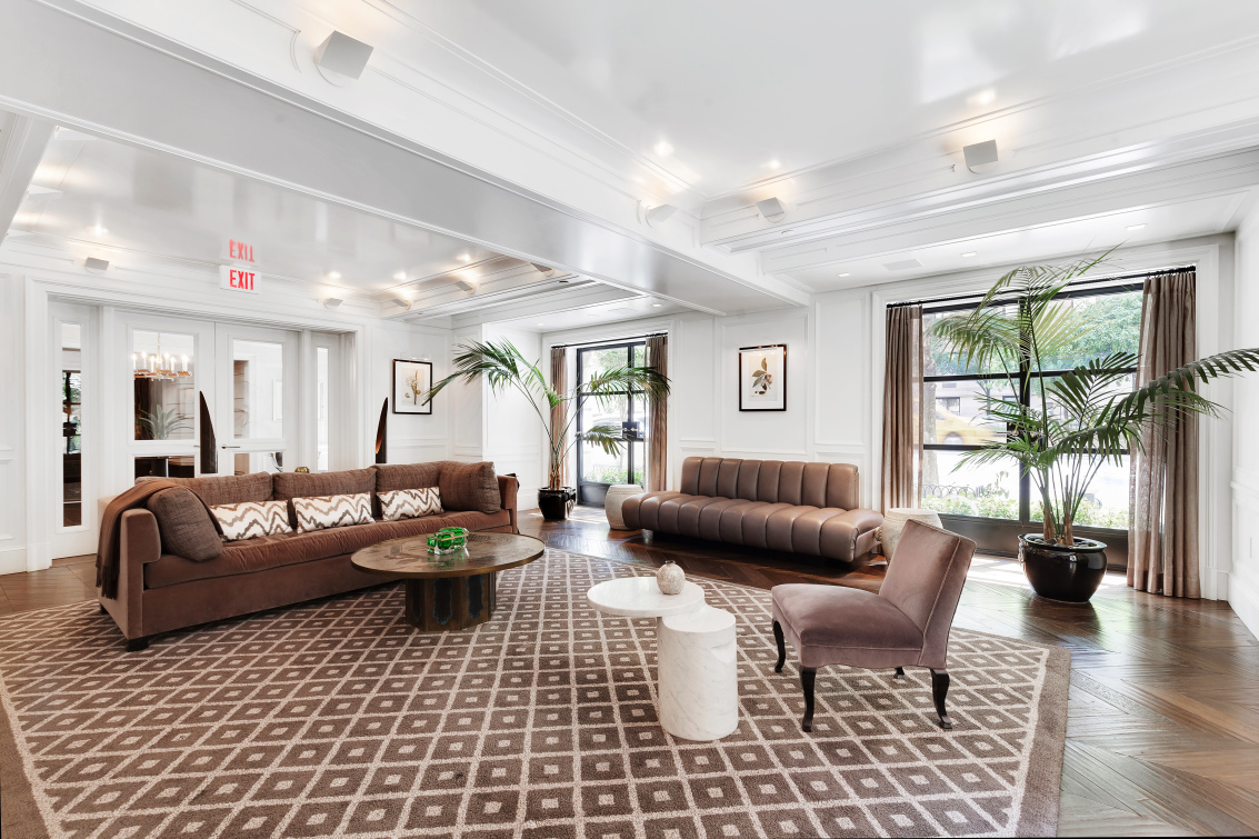 530 Park Avenue, Unit 4A Manhattan, NY 10065 - Photo 12 of 16 a living room with furniture and a window