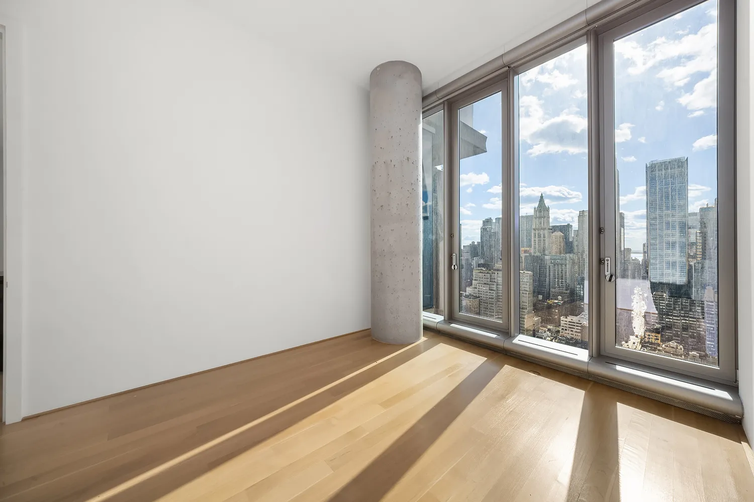 a view of a room with a large window