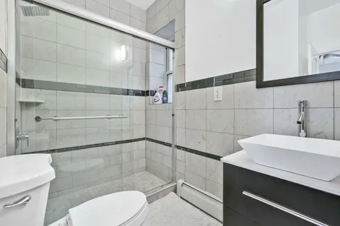 a bedroom with a bed and closet