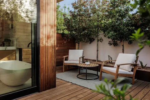 a room with a table and chairs