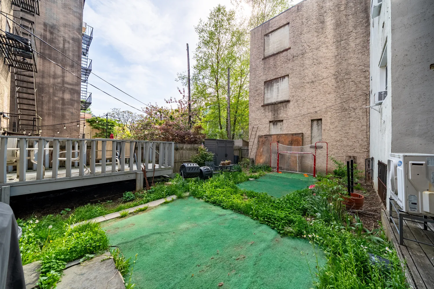 a view of a wooden deck in front of a building