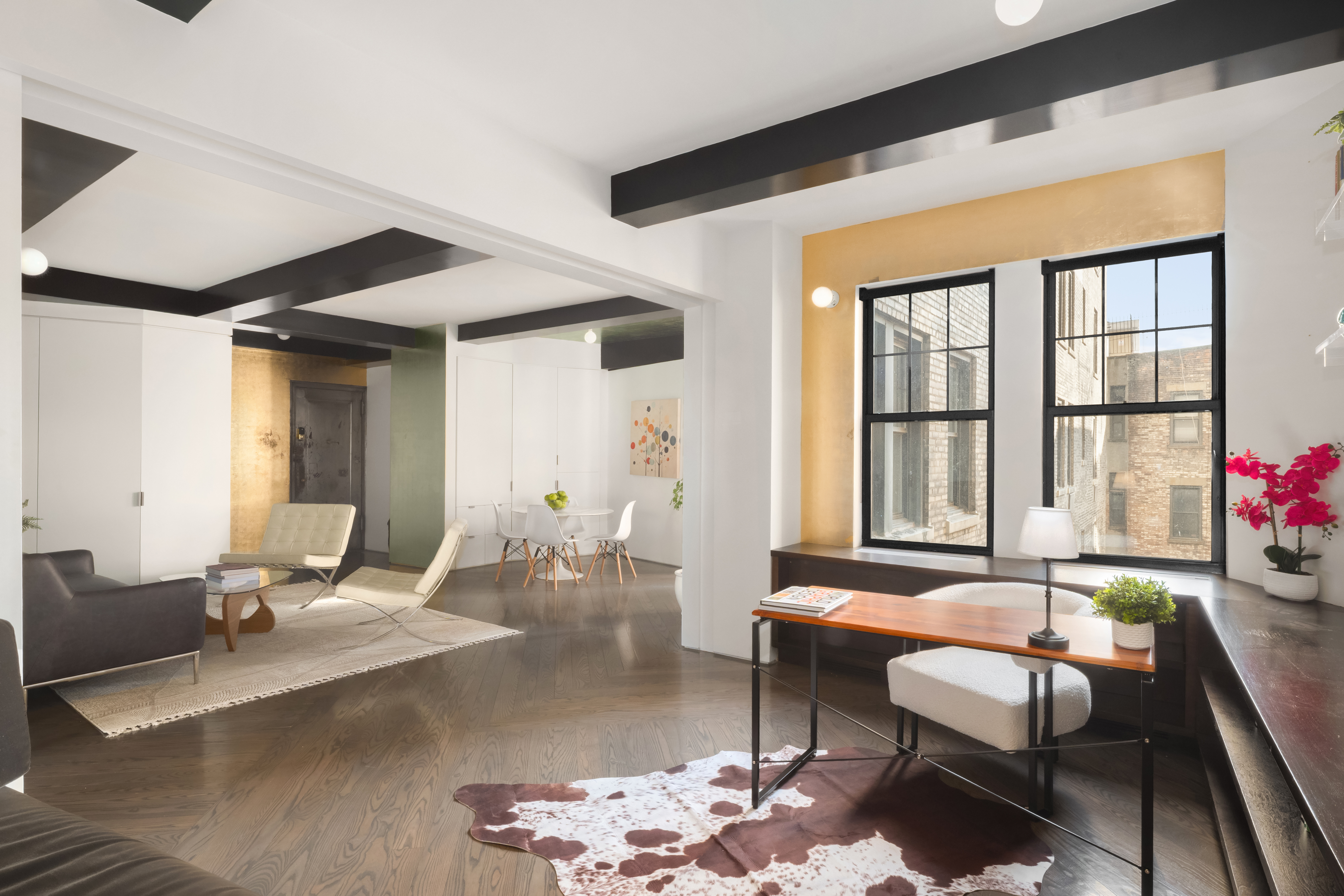 170 2nd Avenue, Unit 5A Manhattan, NY 10003 - Photo 7 of 15 a living room with furniture and a large window