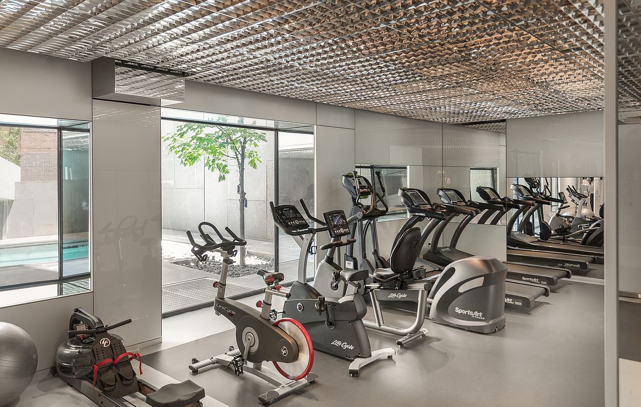 100 11th Avenue, Unit 5A Manhattan, NY 10011 - Photo 14 of 20 a view of a room with gym equipment