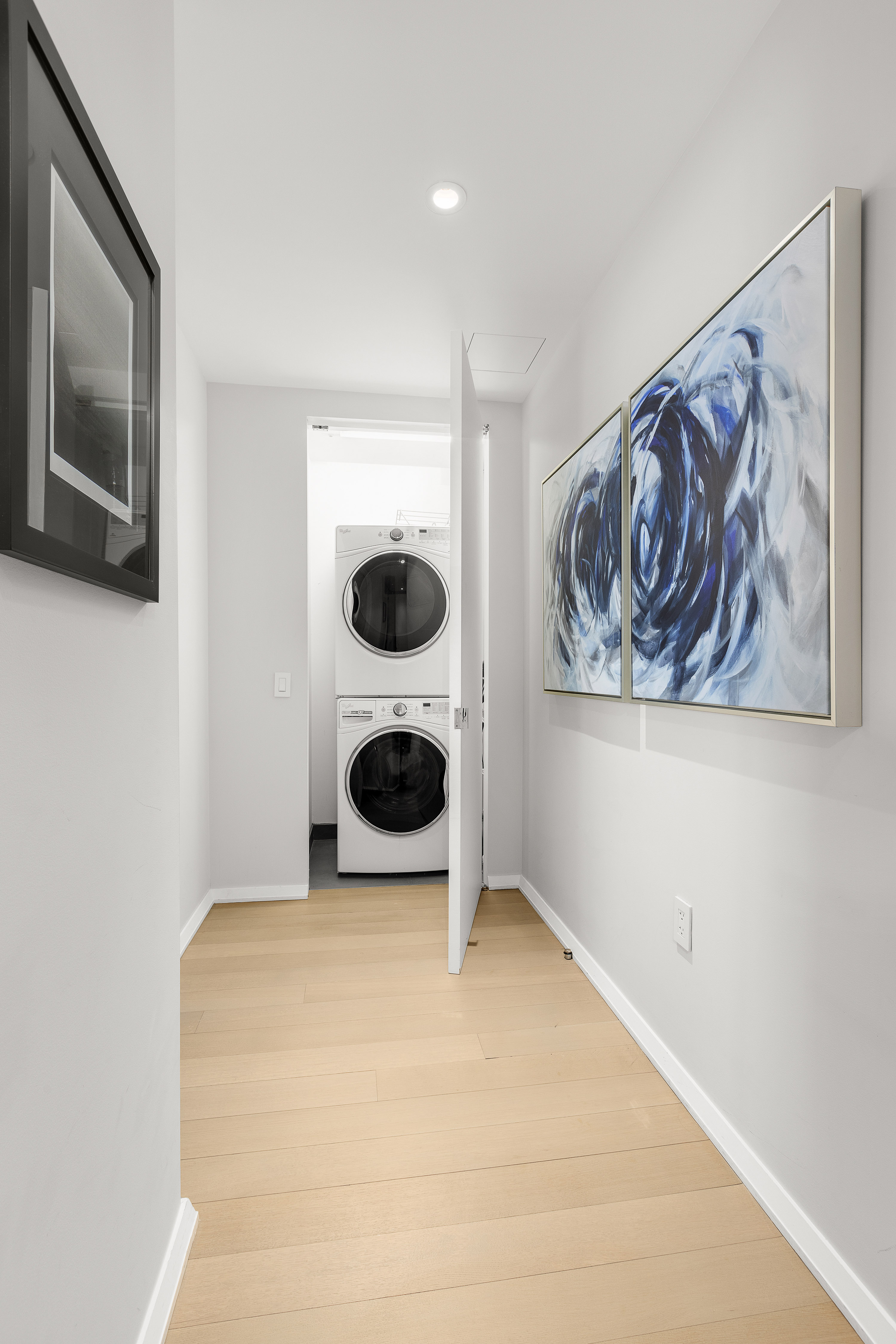 50 West Street, Unit 14B Manhattan, NY 10006 - Photo 15 of 29 a view of a livingroom with furniture and dishwasher