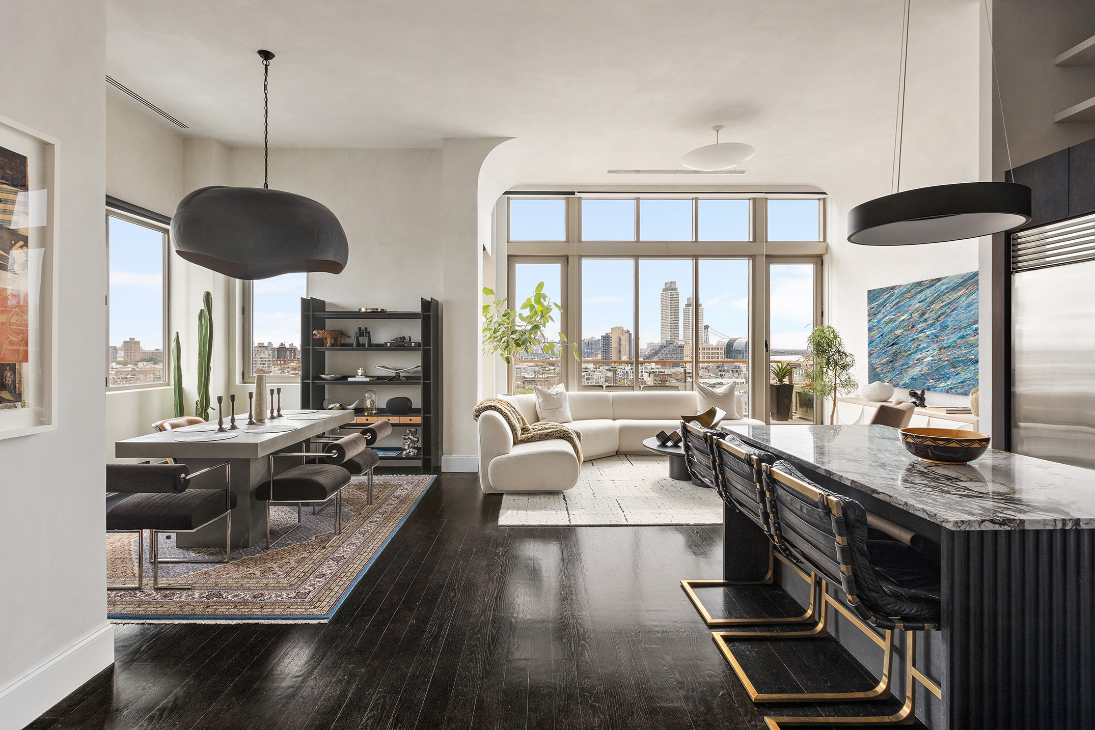 144 North 8th Street, Unit 12B Brooklyn, NY 11249 - Photo 2 of 15 a living room with furniture and a large window