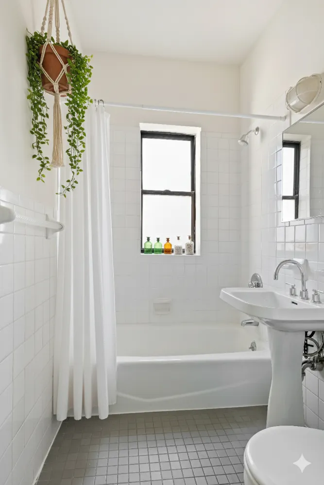 a bathroom with a sink a toilet and bathtub