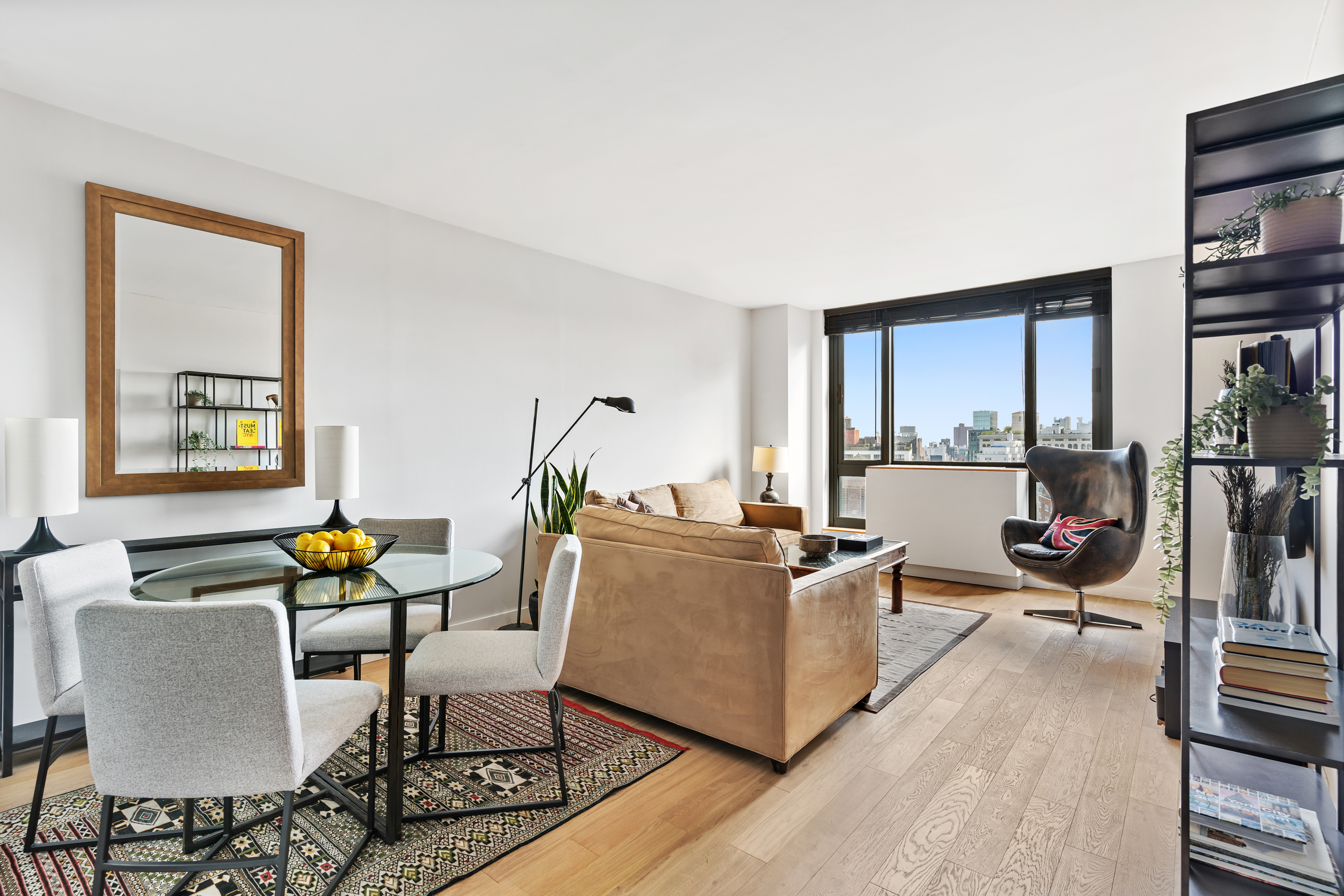 a living room with furniture and a window