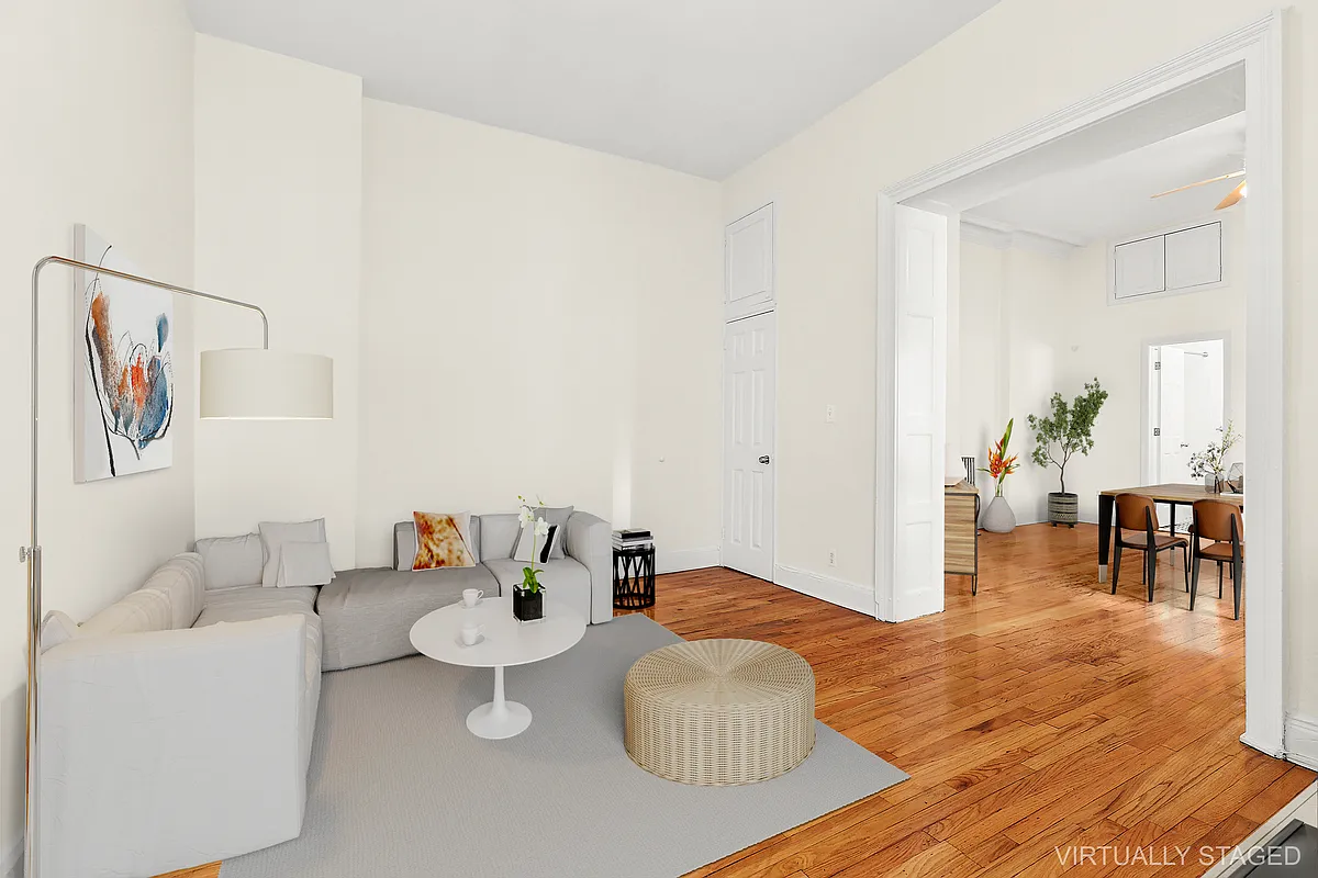 1102 Dean Street, Unit 4 Brooklyn, NY 11216 - Photo 2 of 12 a living room with furniture and a wooden floor