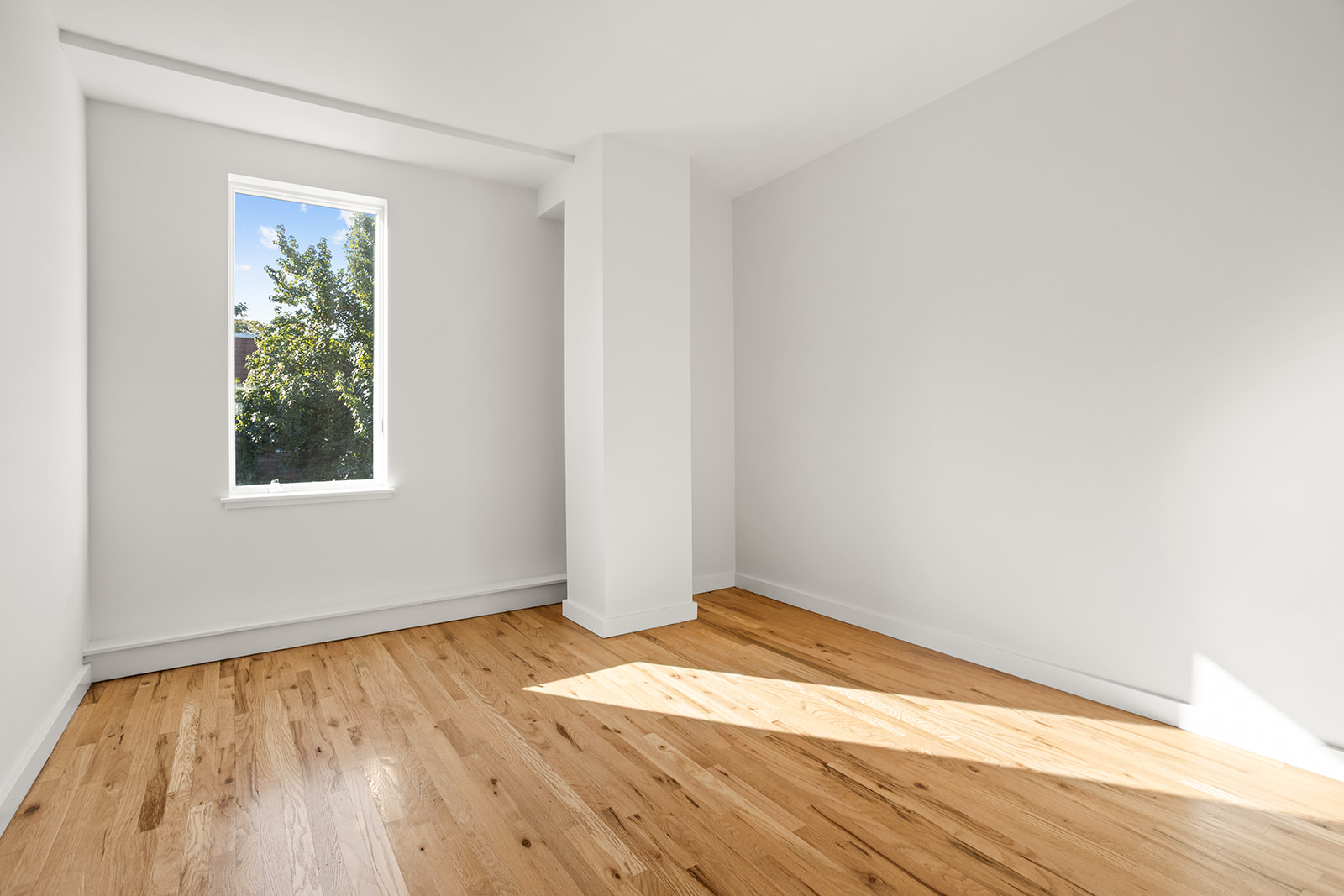 65 Jackson Street, Unit 2 Brooklyn, NY 11211 - Photo 3 of 7 a view of empty room with wooden floor
