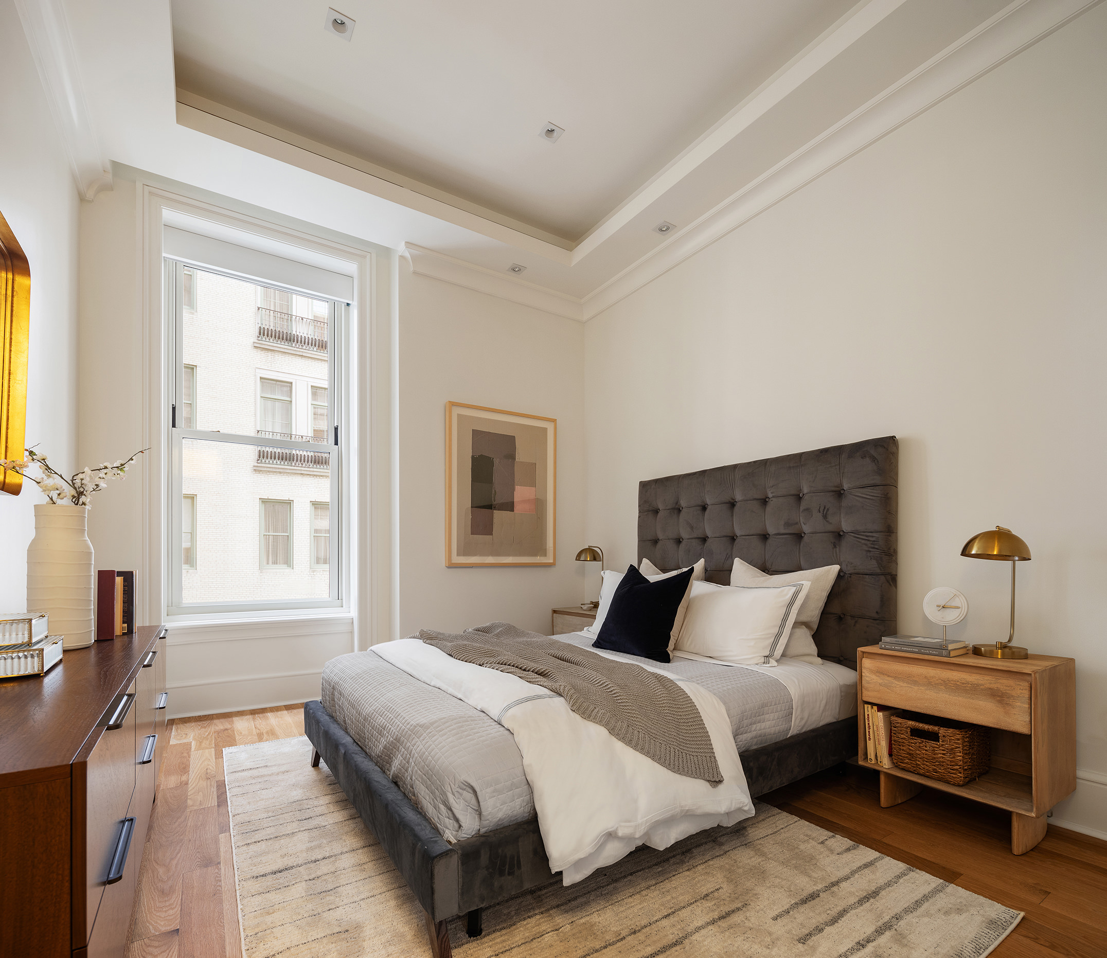 1 Central Park South, Unit 8010203 Manhattan, NY 10019 - Photo 21 of 45 a bedroom with bed and window