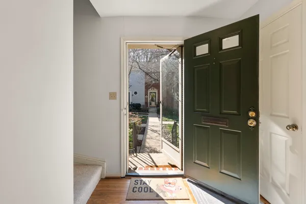 a view of a walk in closet and bathroom