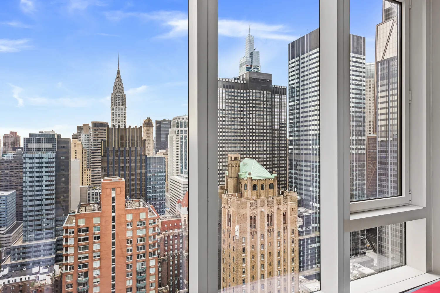 a view of city with tall buildings