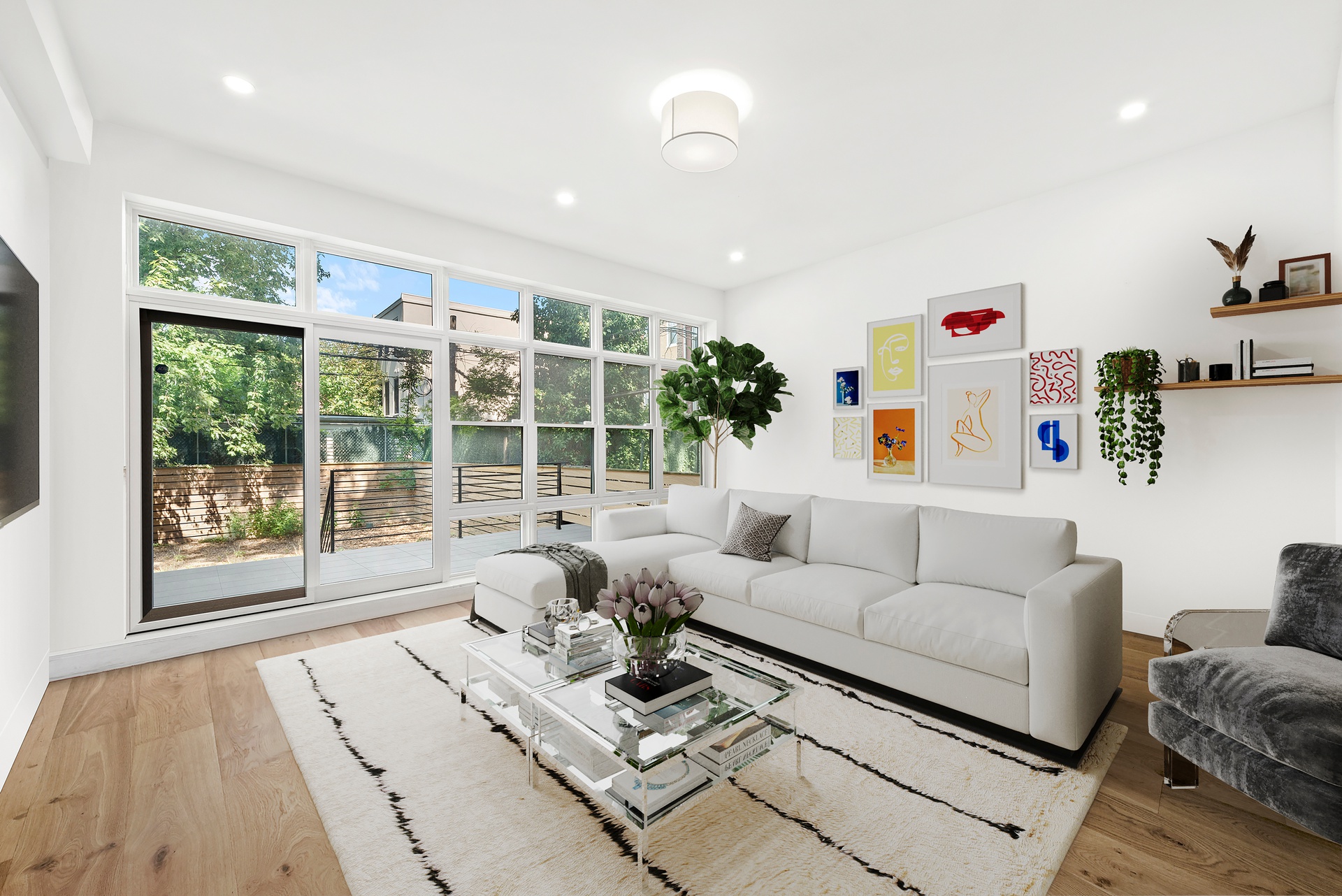 65 Bainbridge Street Brooklyn, NY 11233 - Photo 2 of 24 a living room with furniture and a large window