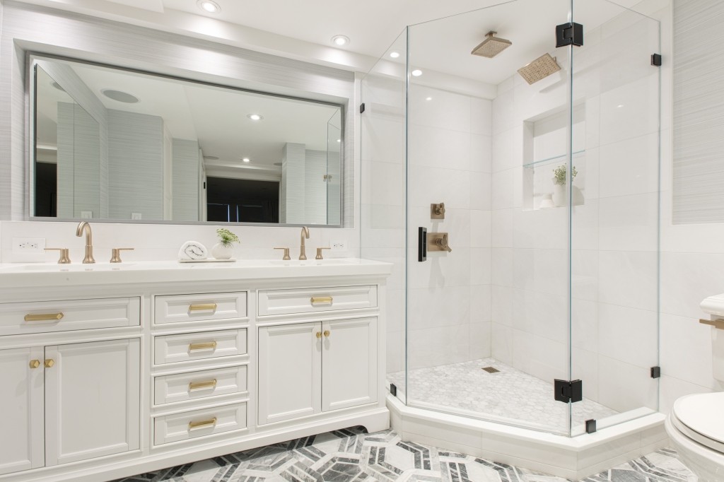 433 West 34th Street, Unit 4ABC Manhattan, NY 10001 - Photo 14 of 20 a bathroom with a bathtub shower sink and toilet