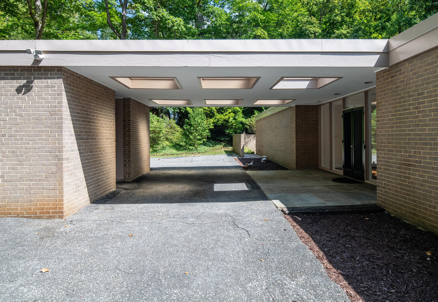 7101 Crail Drive Bethesda, MD 20817 - Photo 7 of 15 a view of entrance gate of a house